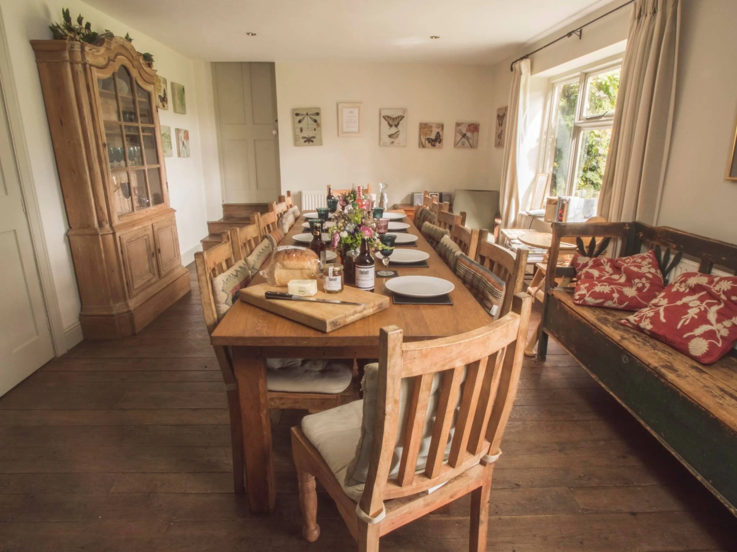 a wooden table and chairs at the brewhouse doddington hall