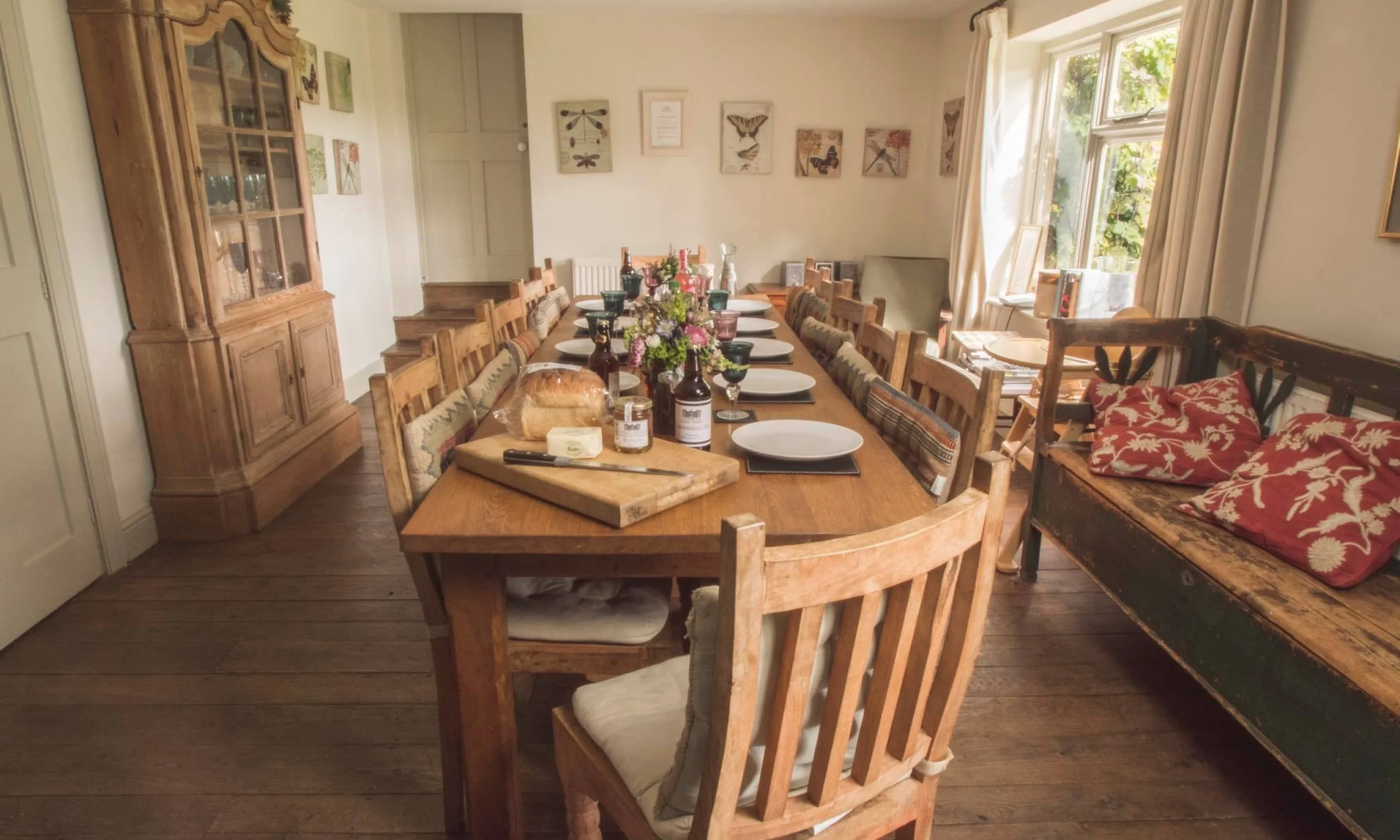 a wooden table and chairs at the brewhouse doddington hall