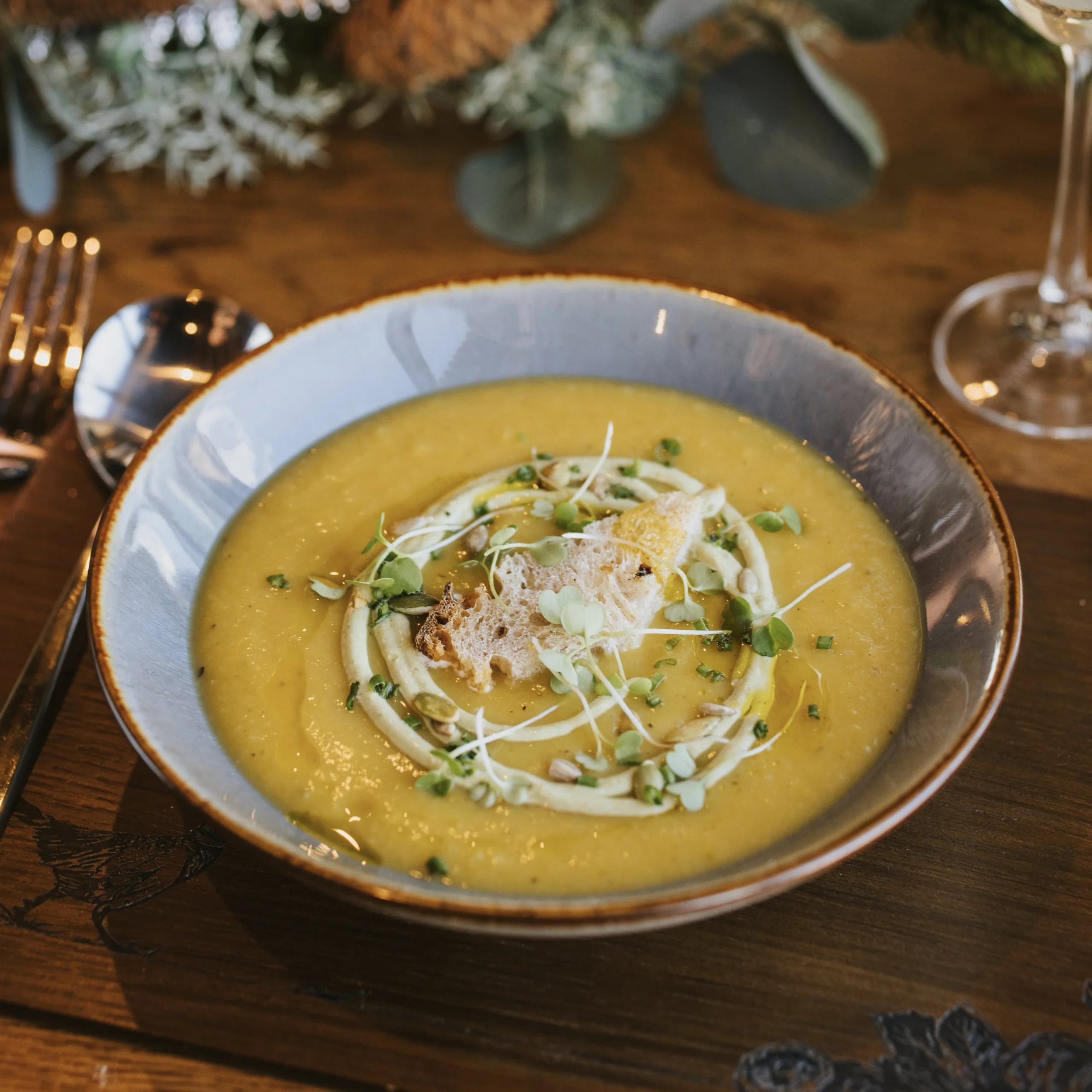 a bowl of celeriac soup at doddington hall grain store