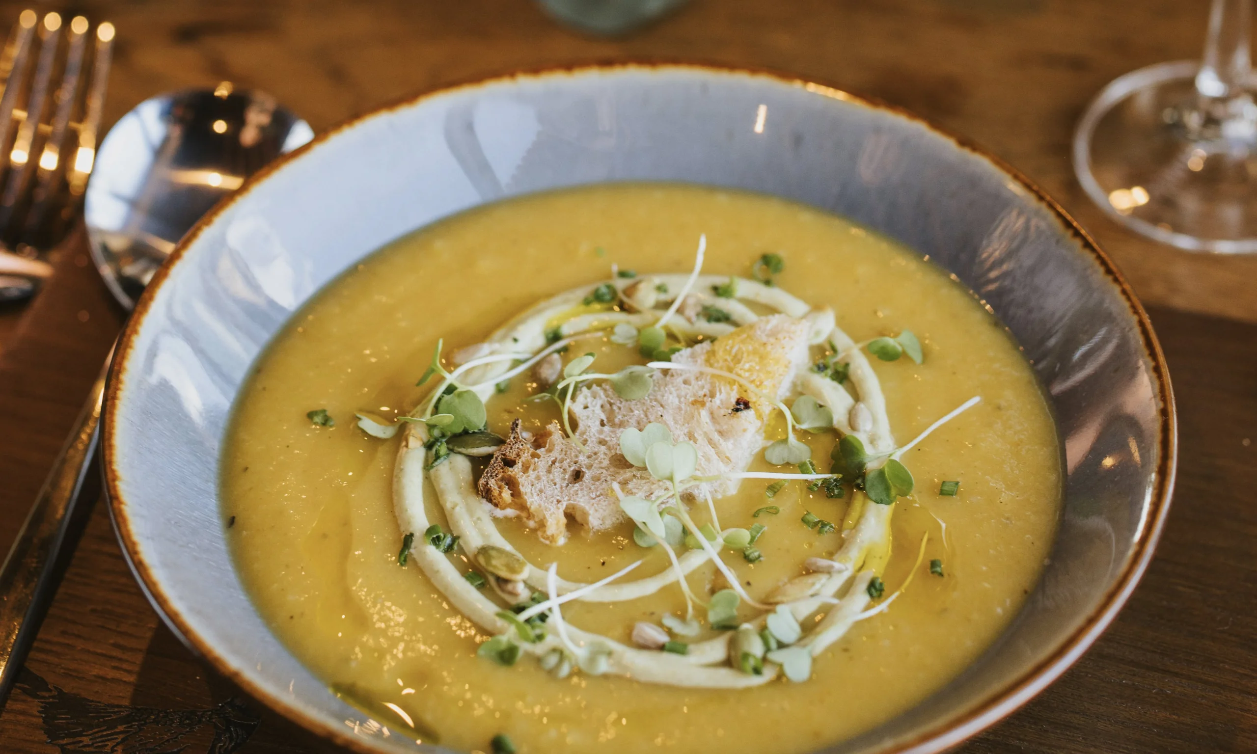 a bowl of celeriac soup at doddington hall grain store