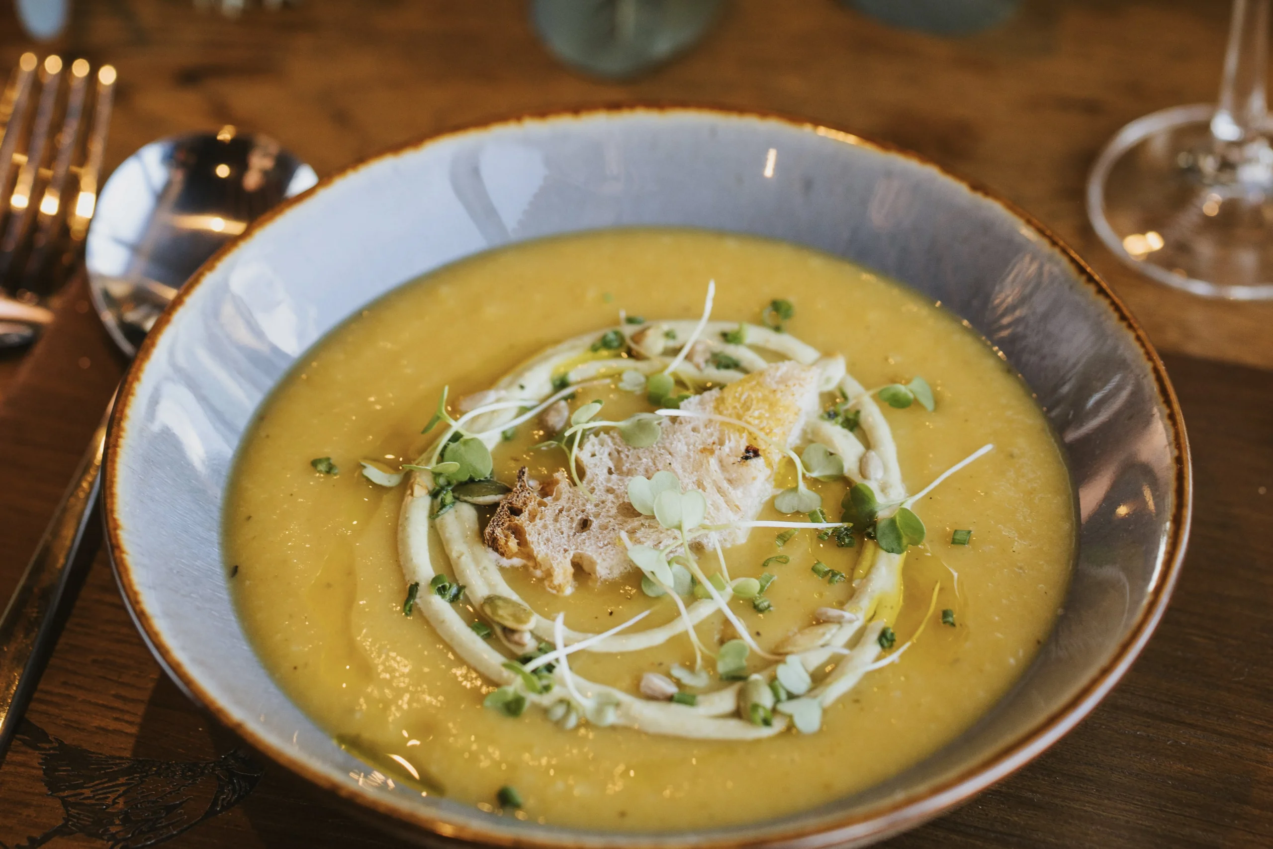 a bowl of celeriac soup at doddington hall grain store