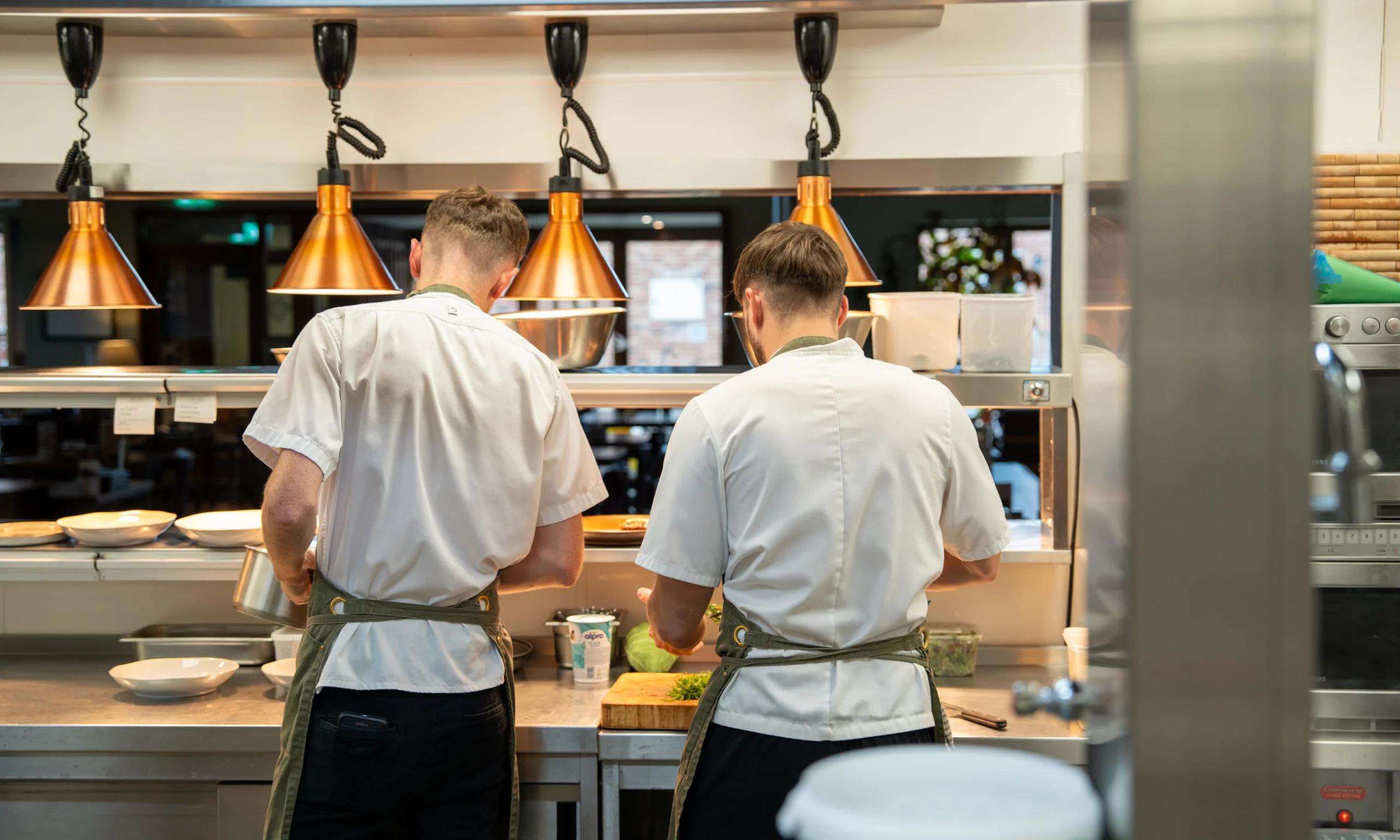 chefs in the kitchen at doddington grain store
