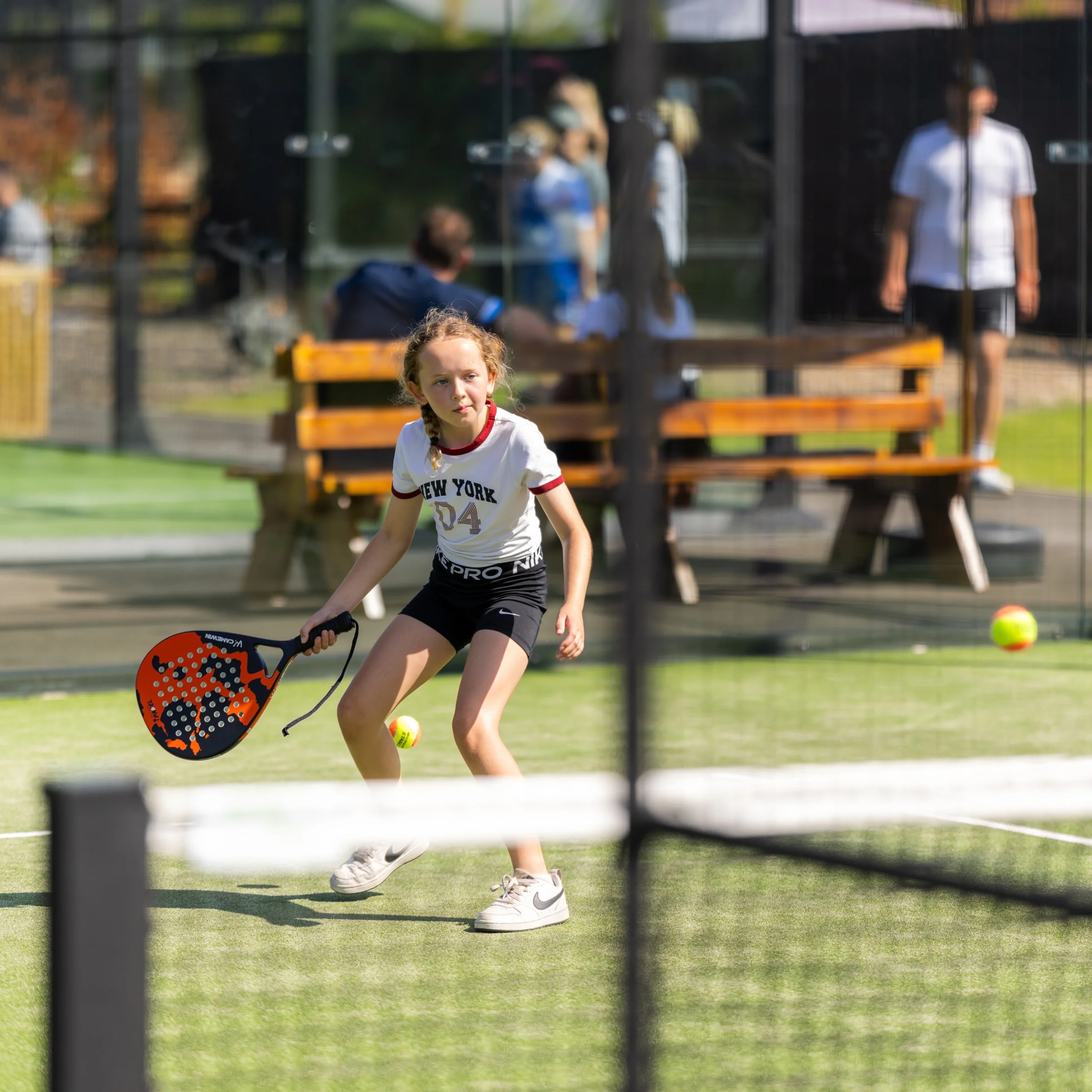 girl playing padel at doddington hall