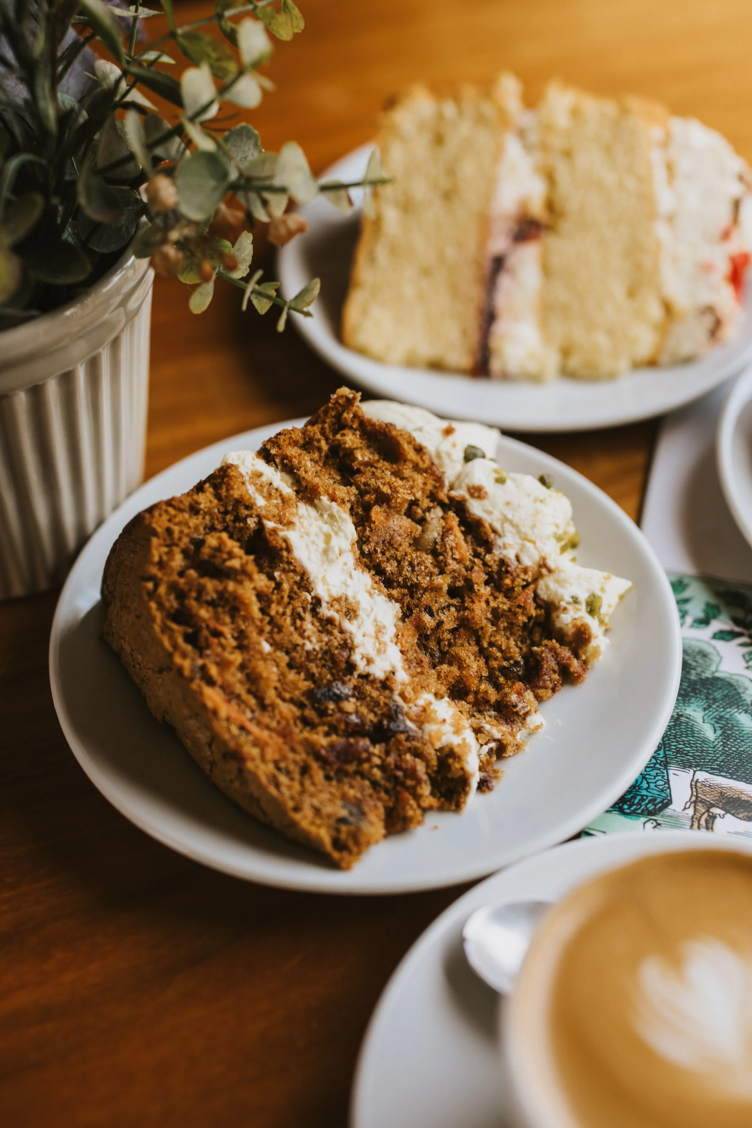 slices of carrot and victoria sponge cake doddington hall farm shop cafe