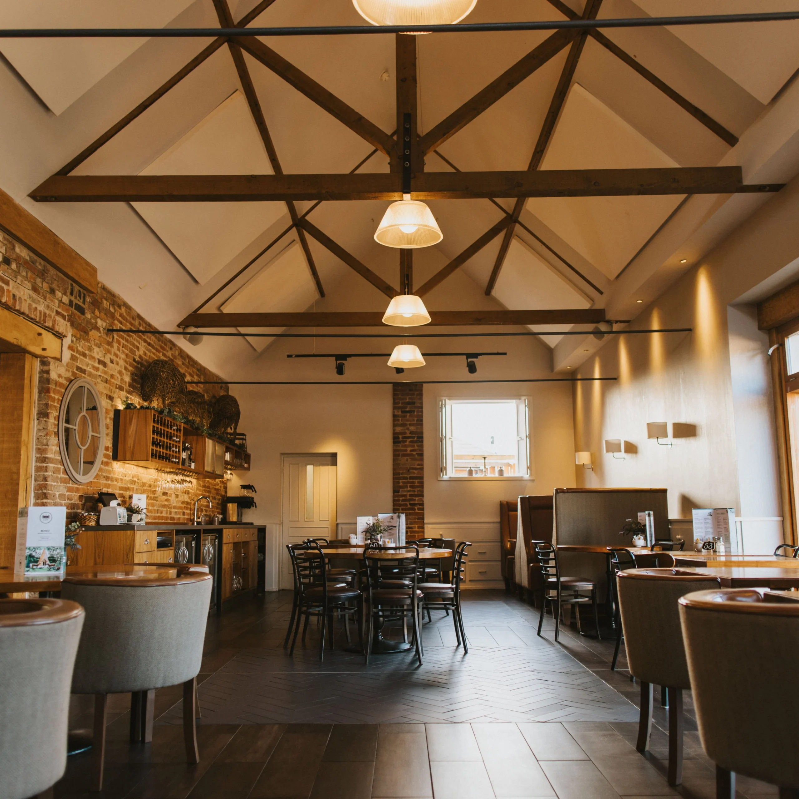 seating space with exposed beams doddington farm shop cafe