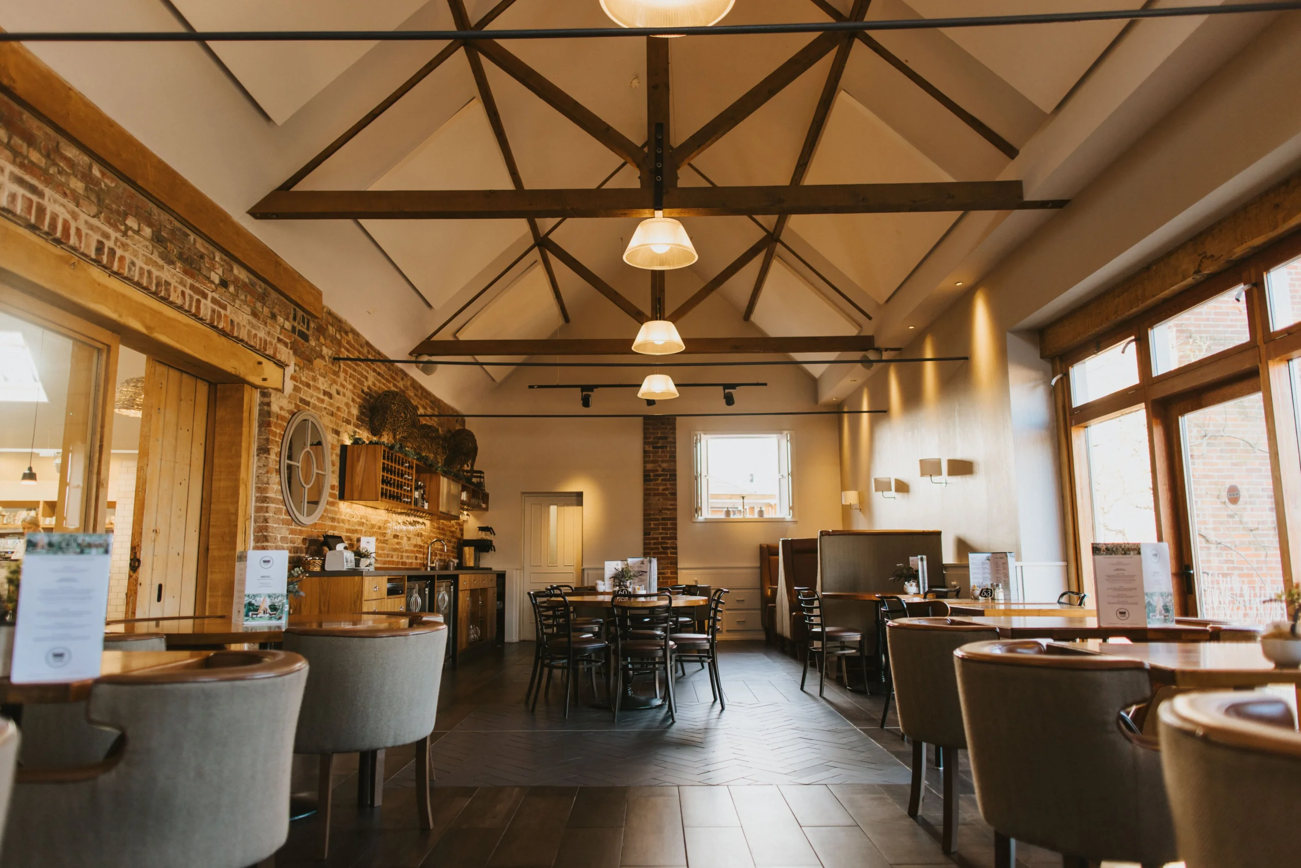 seating space with exposed beams doddington farm shop cafe