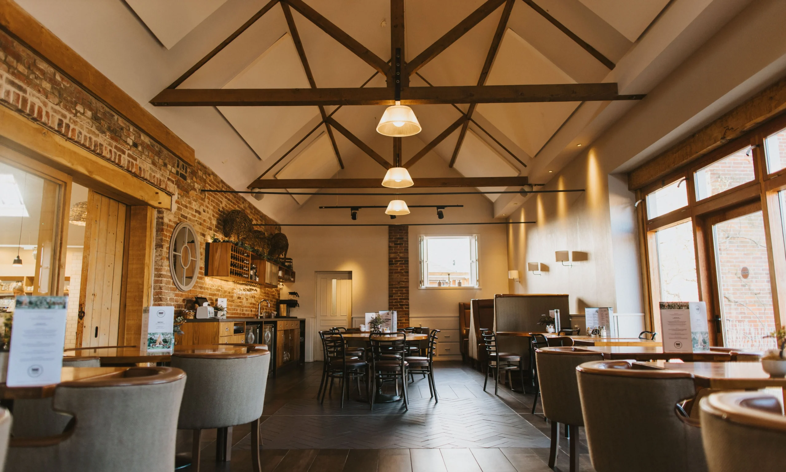 seating space with exposed beams doddington farm shop cafe