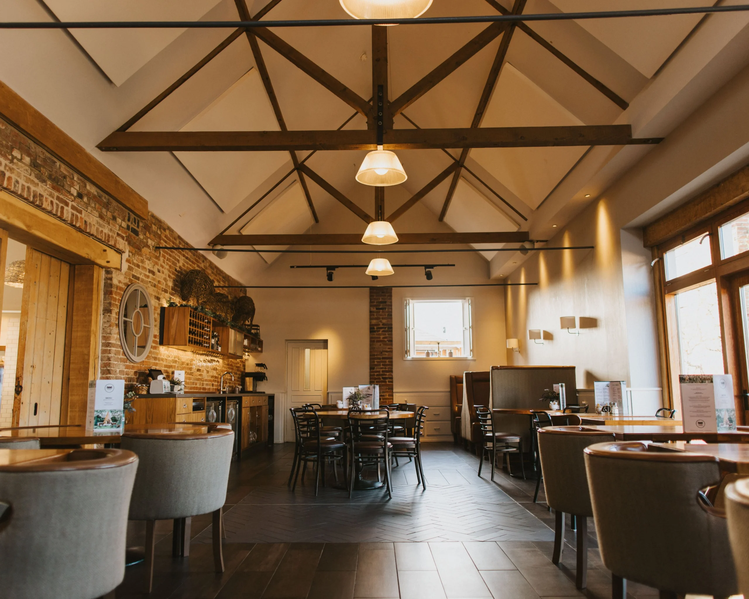 seating space with exposed beams doddington farm shop cafe