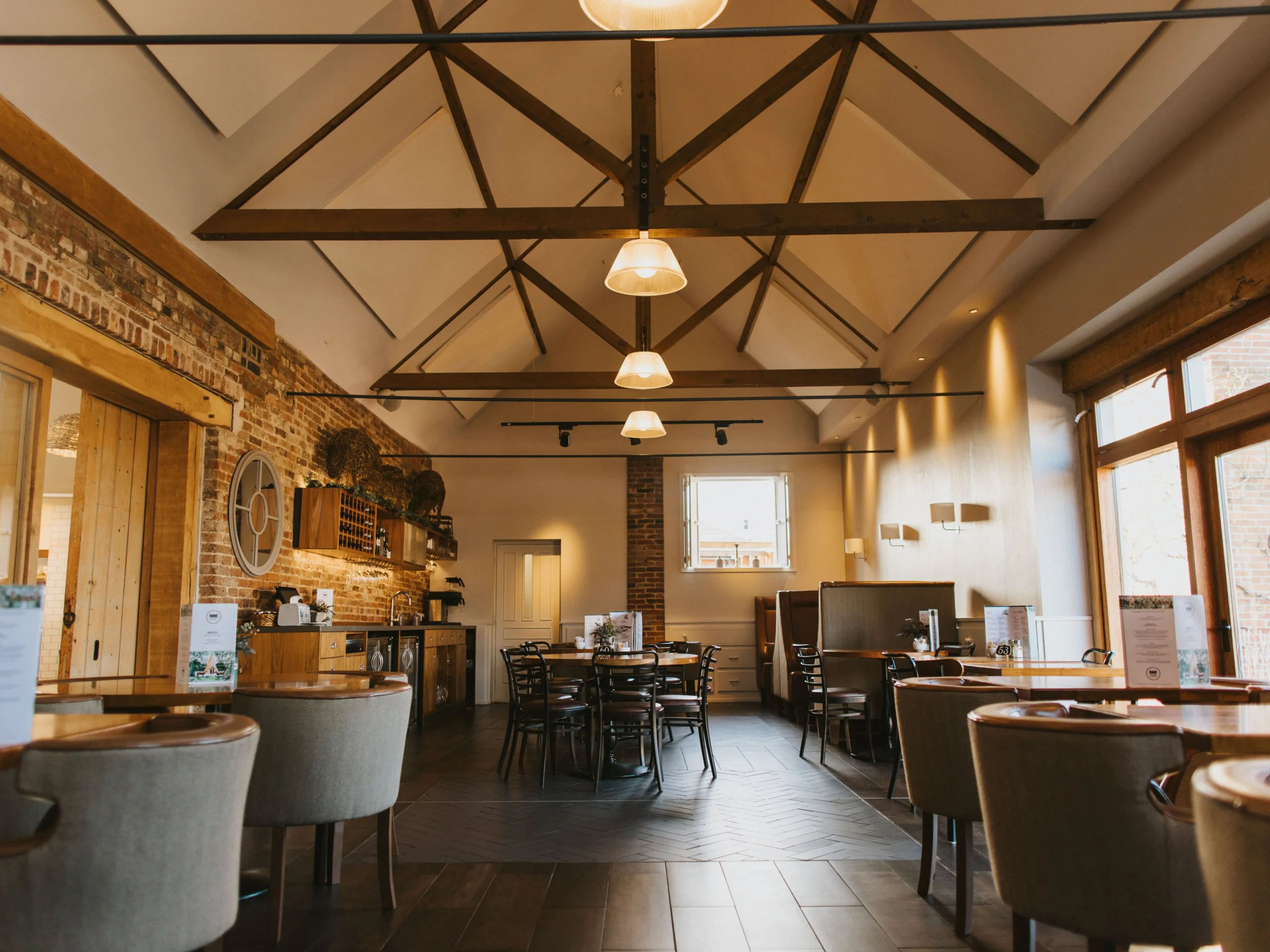 seating space with exposed beams doddington farm shop cafe