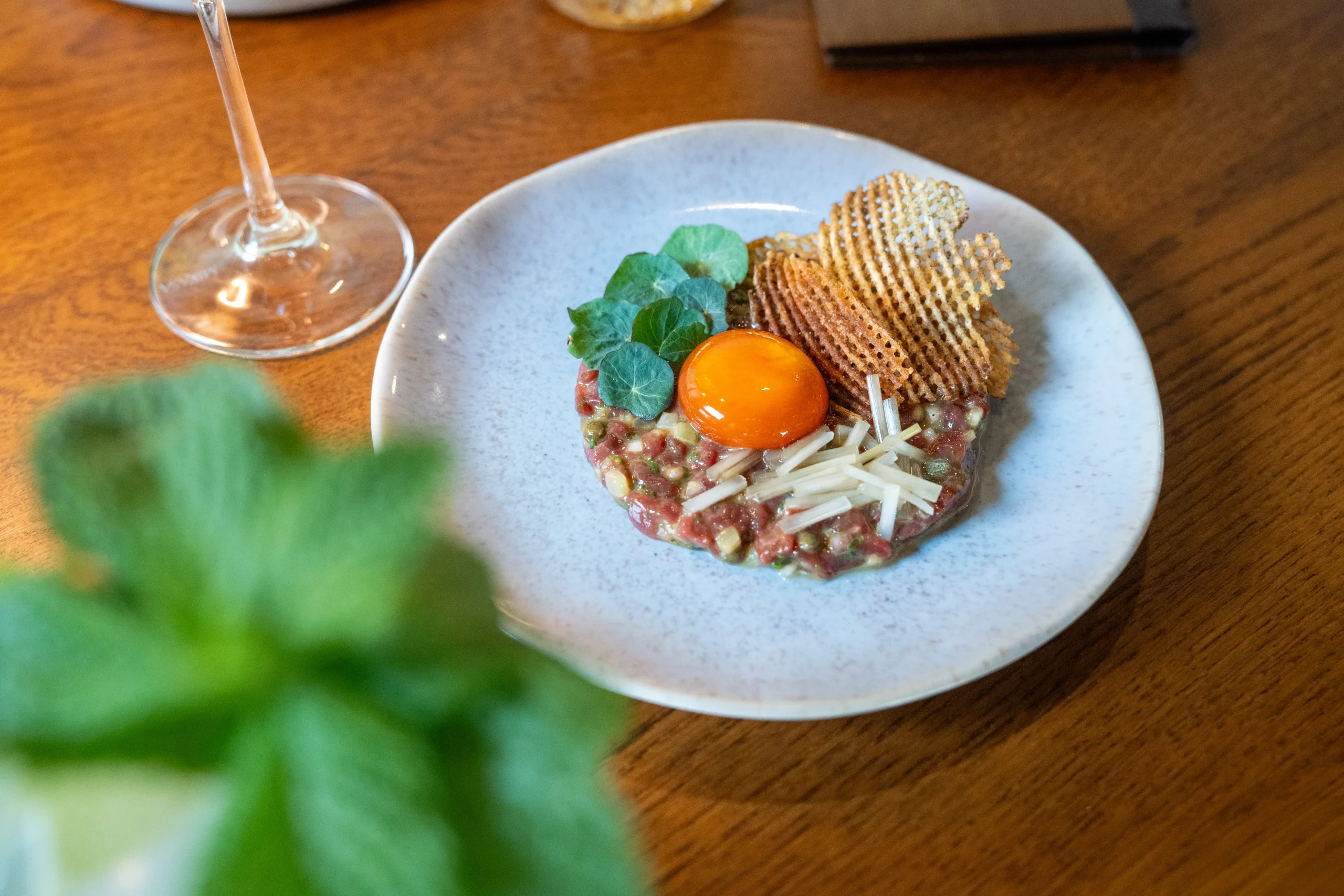 venison tartare with egg yolk at doddington grain store