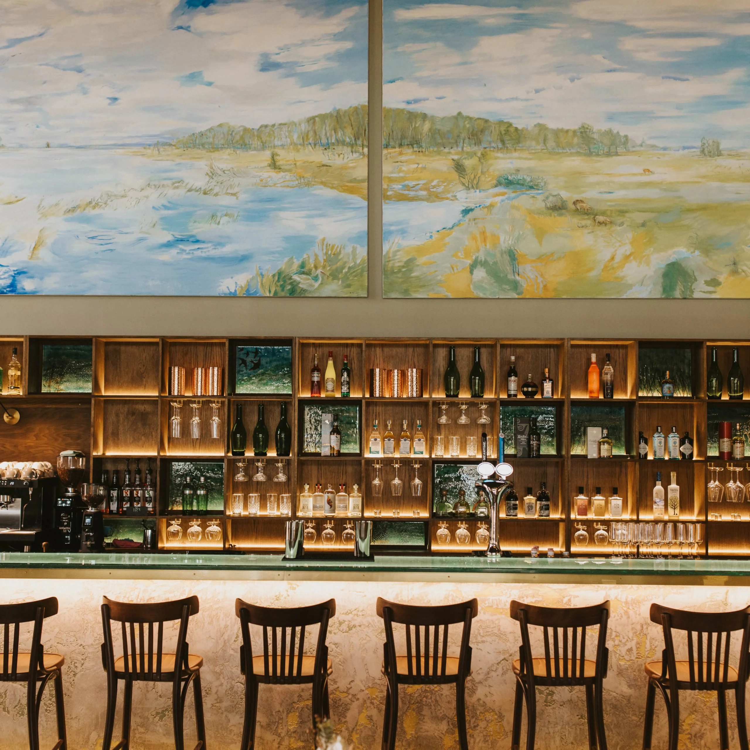 doddington grain store bar with high back stools