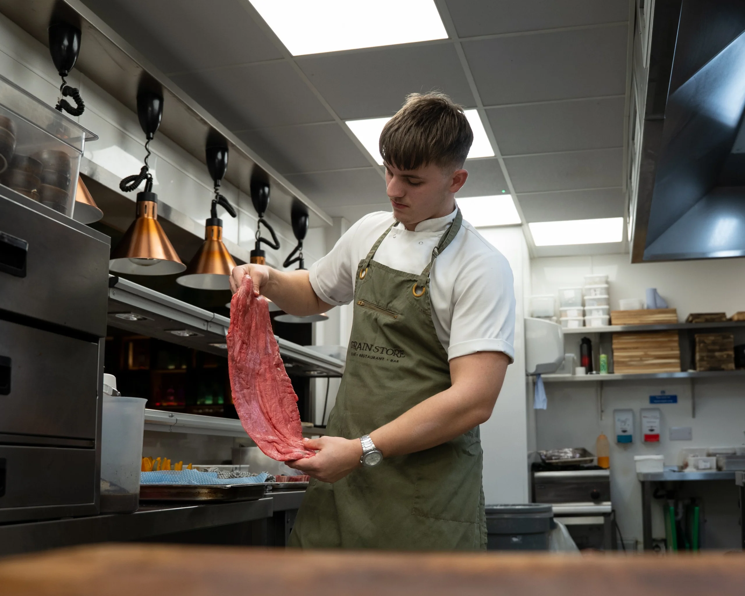 chef preparing beef steak at doddington grain store