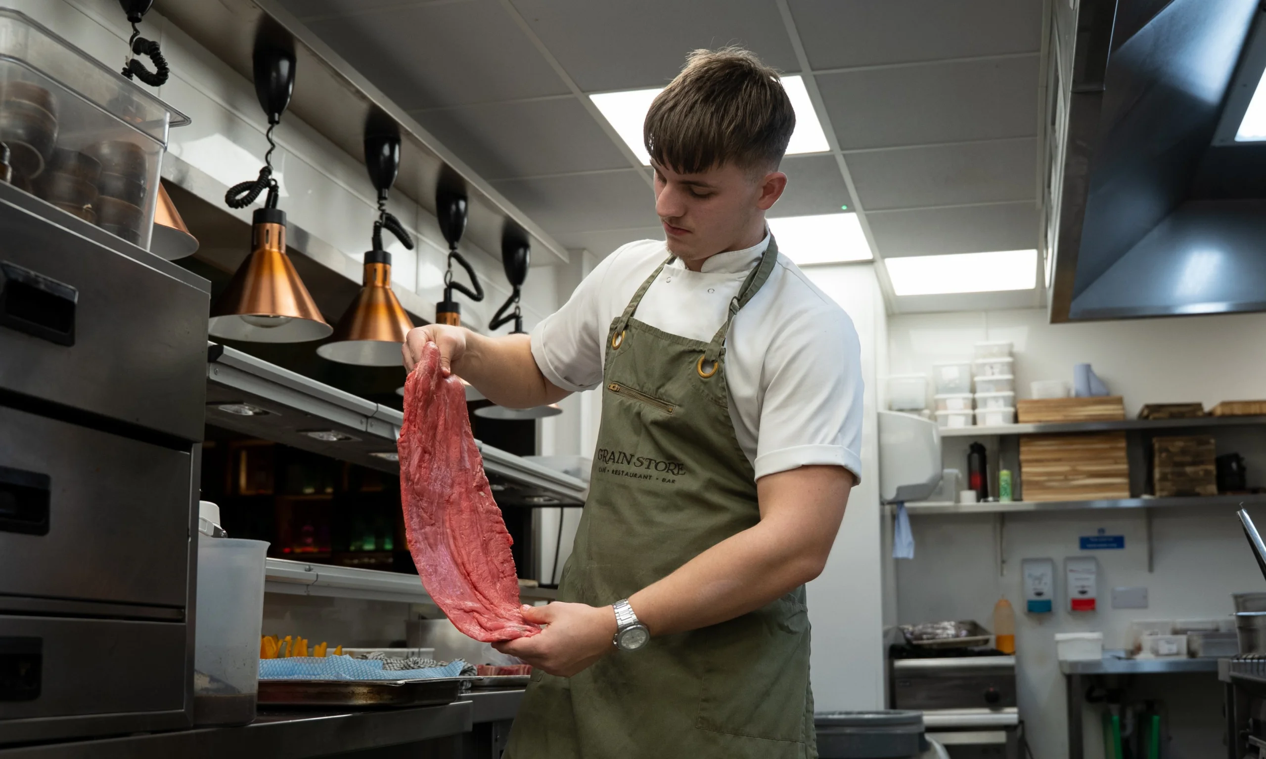 chef preparing beef steak at doddington grain store