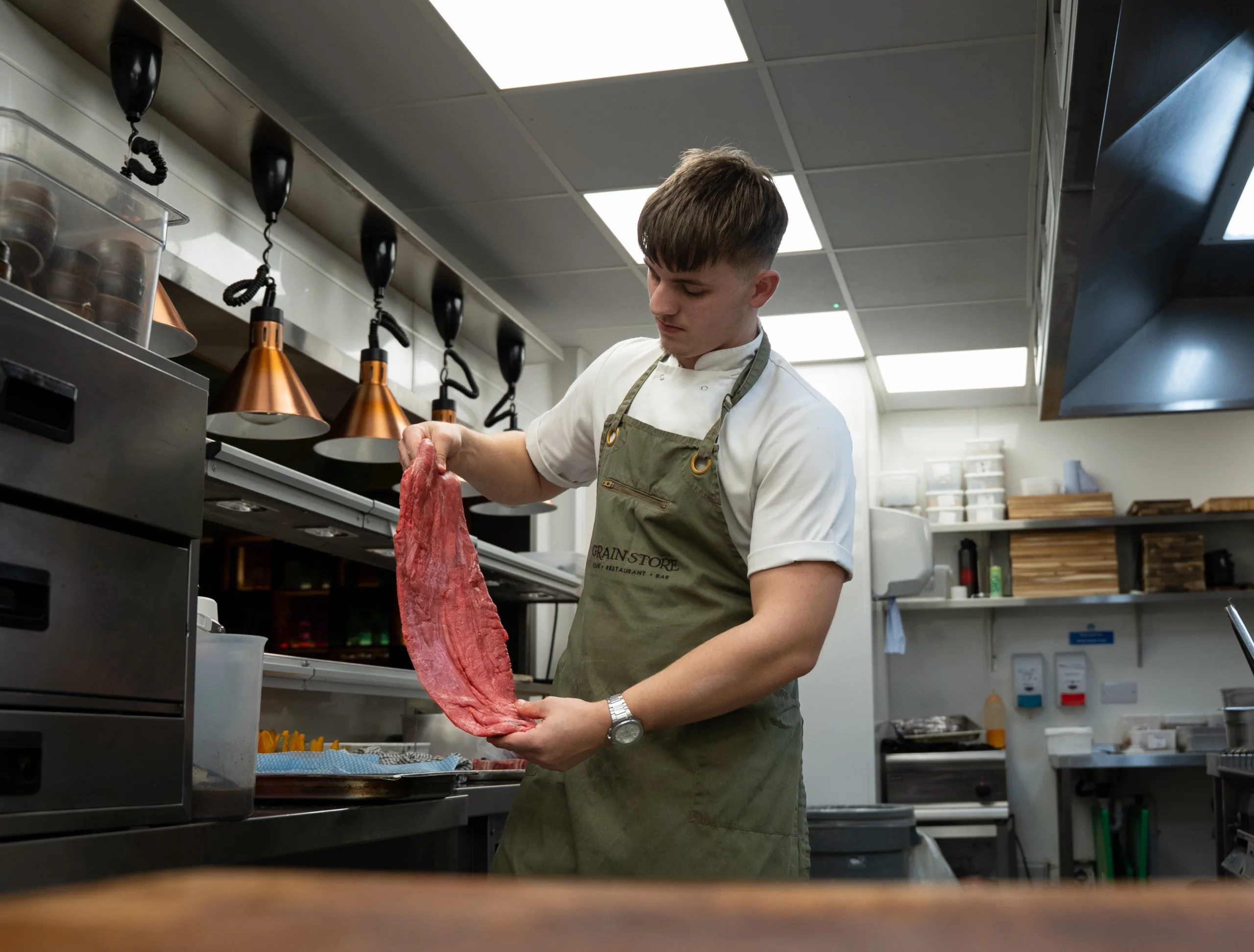 chef preparing beef steak at doddington grain store
