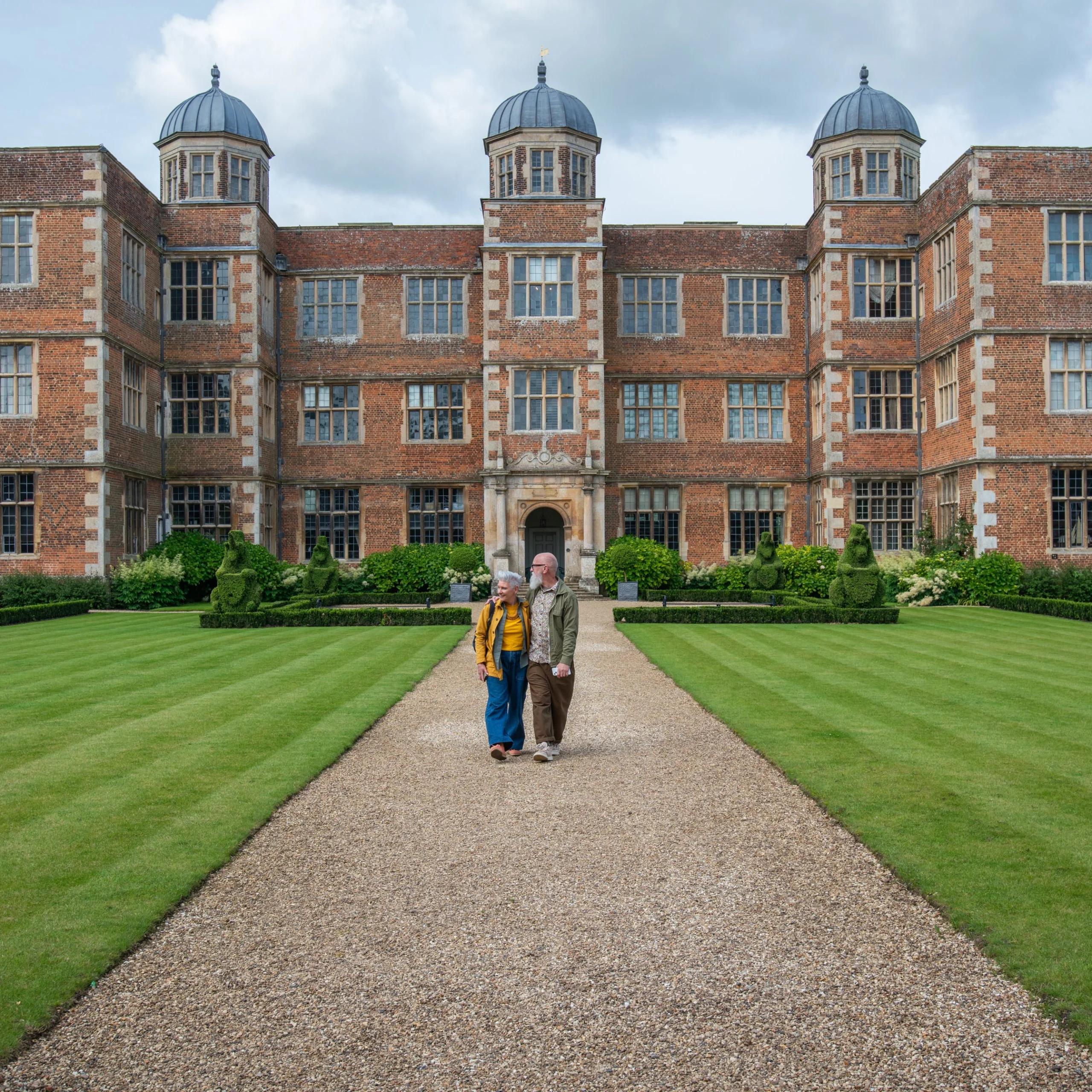 two people in the east front garden at doddington hall