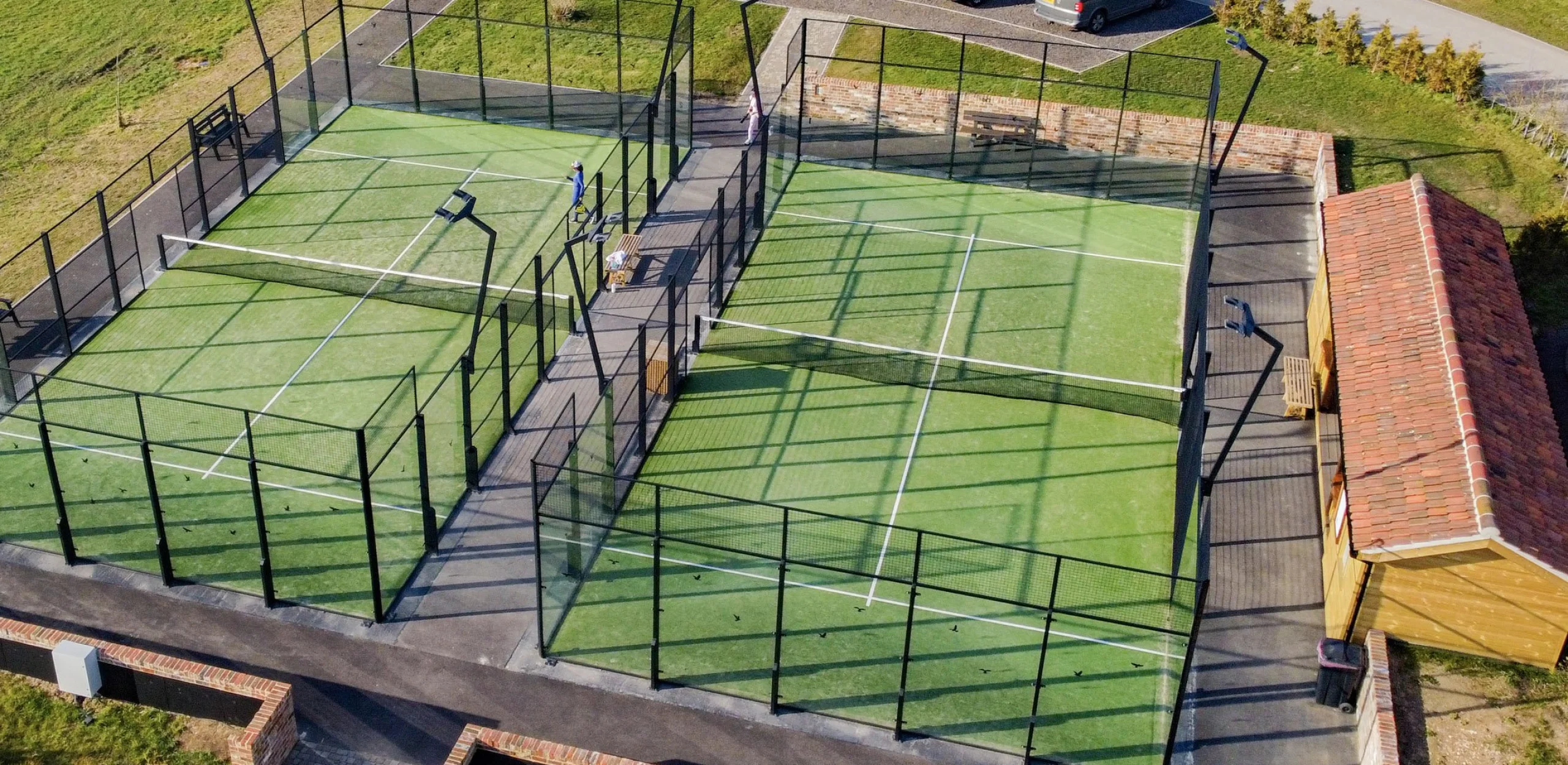 an aerial view of doddington hall padel courts