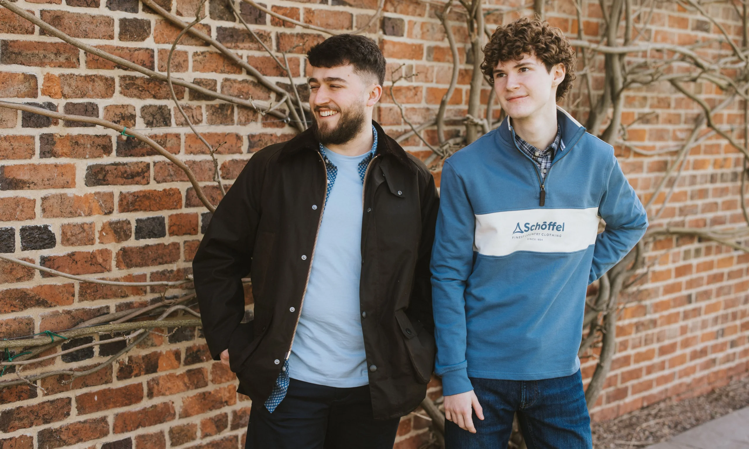 Doddington country clothing two men posing in barbour and schoffel clothing