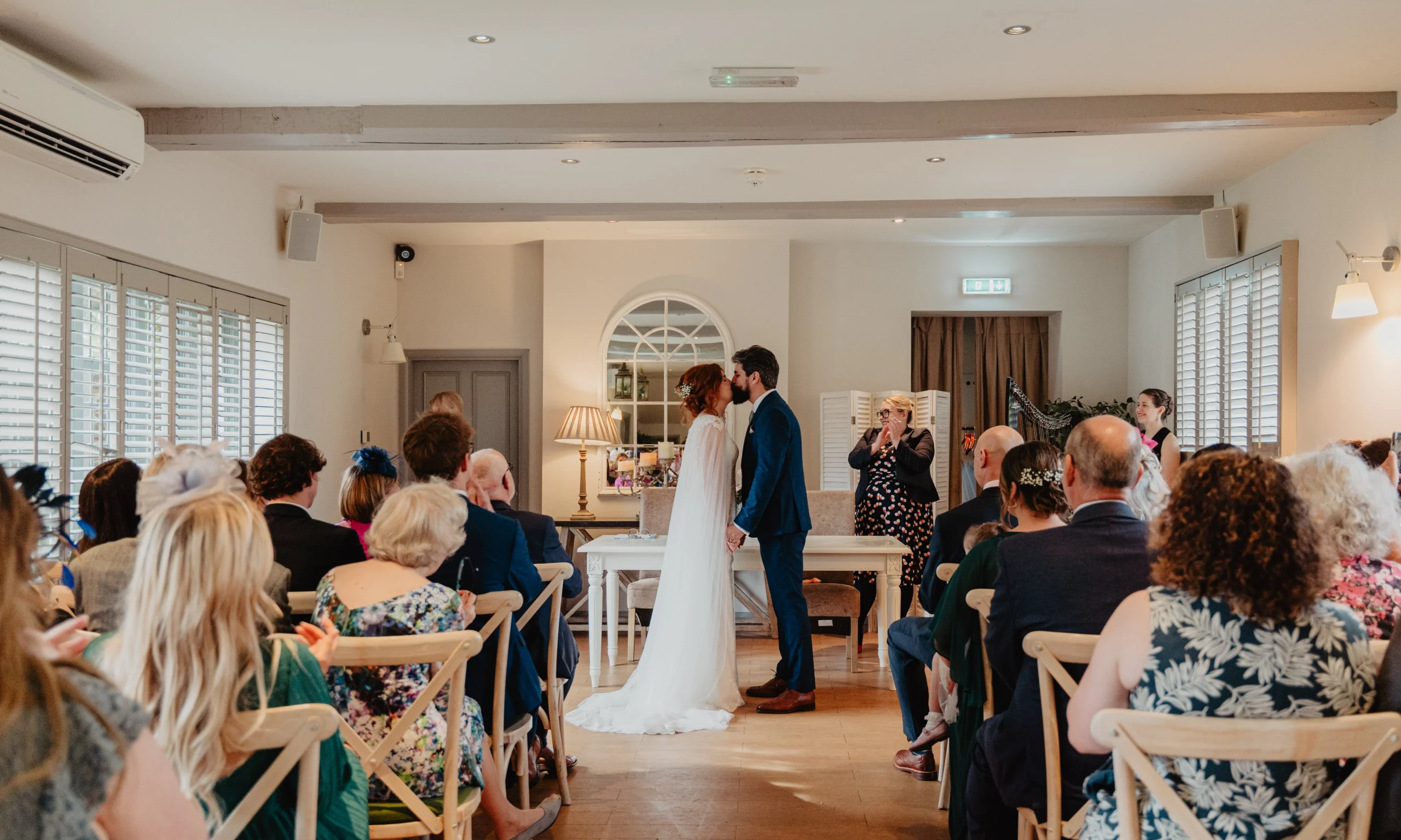 bridge and groom married in the garden room at doddington hall