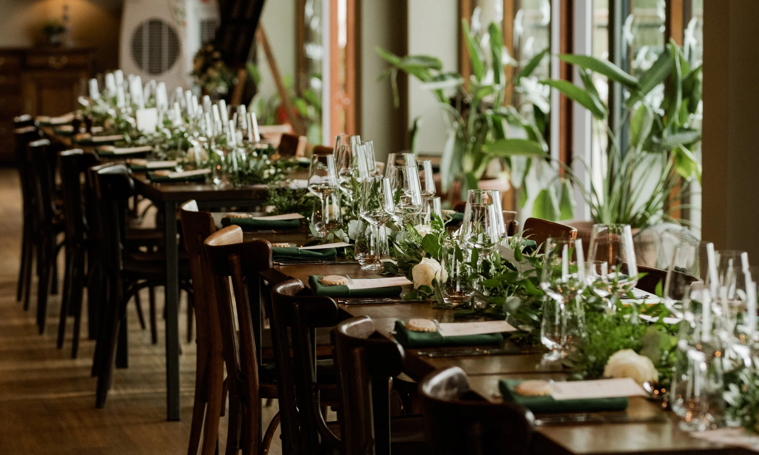a wedding breakfast table scape setup at grain store doddington hall