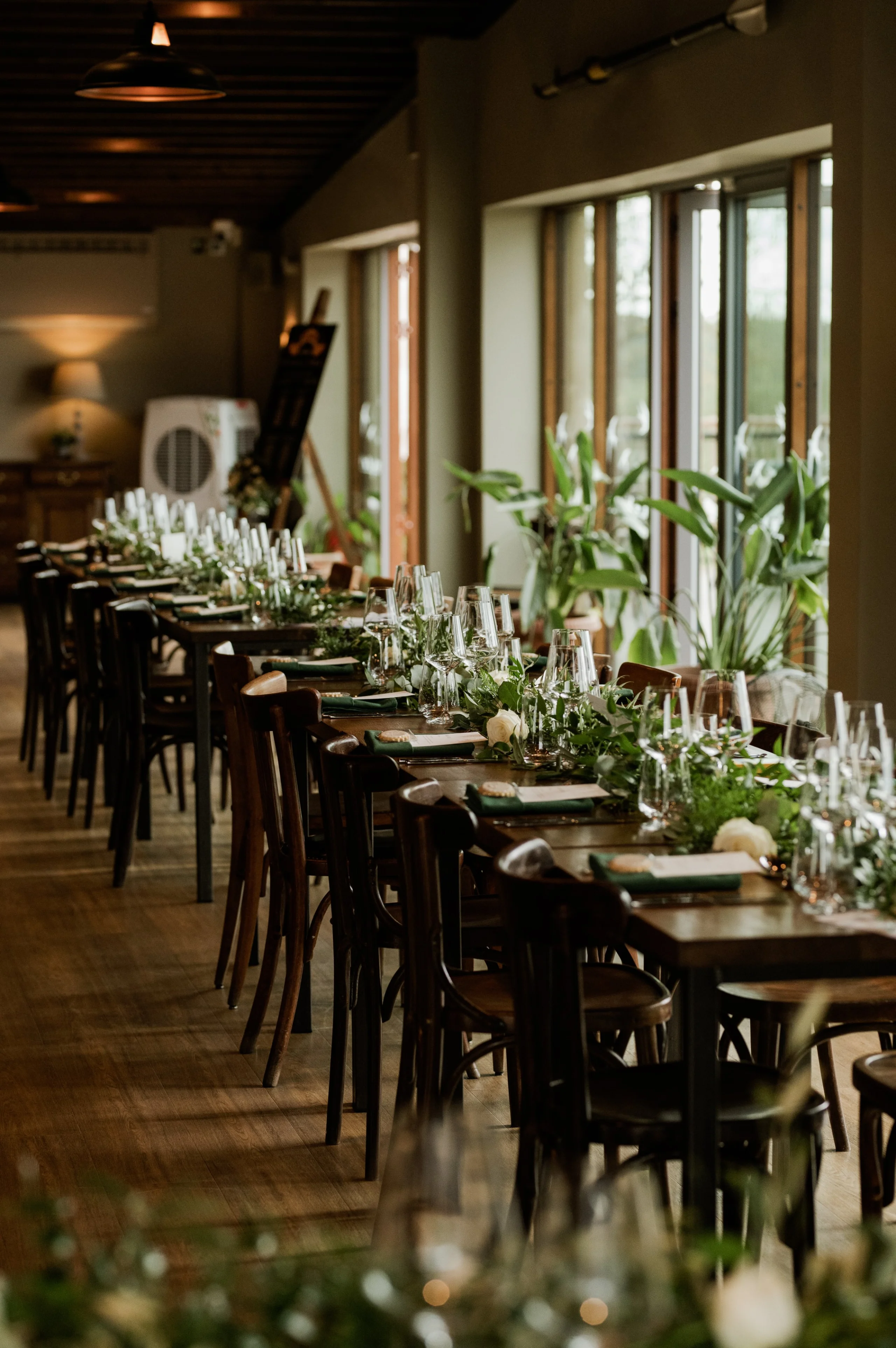 a wedding breakfast table scape setup at grain store doddington hall