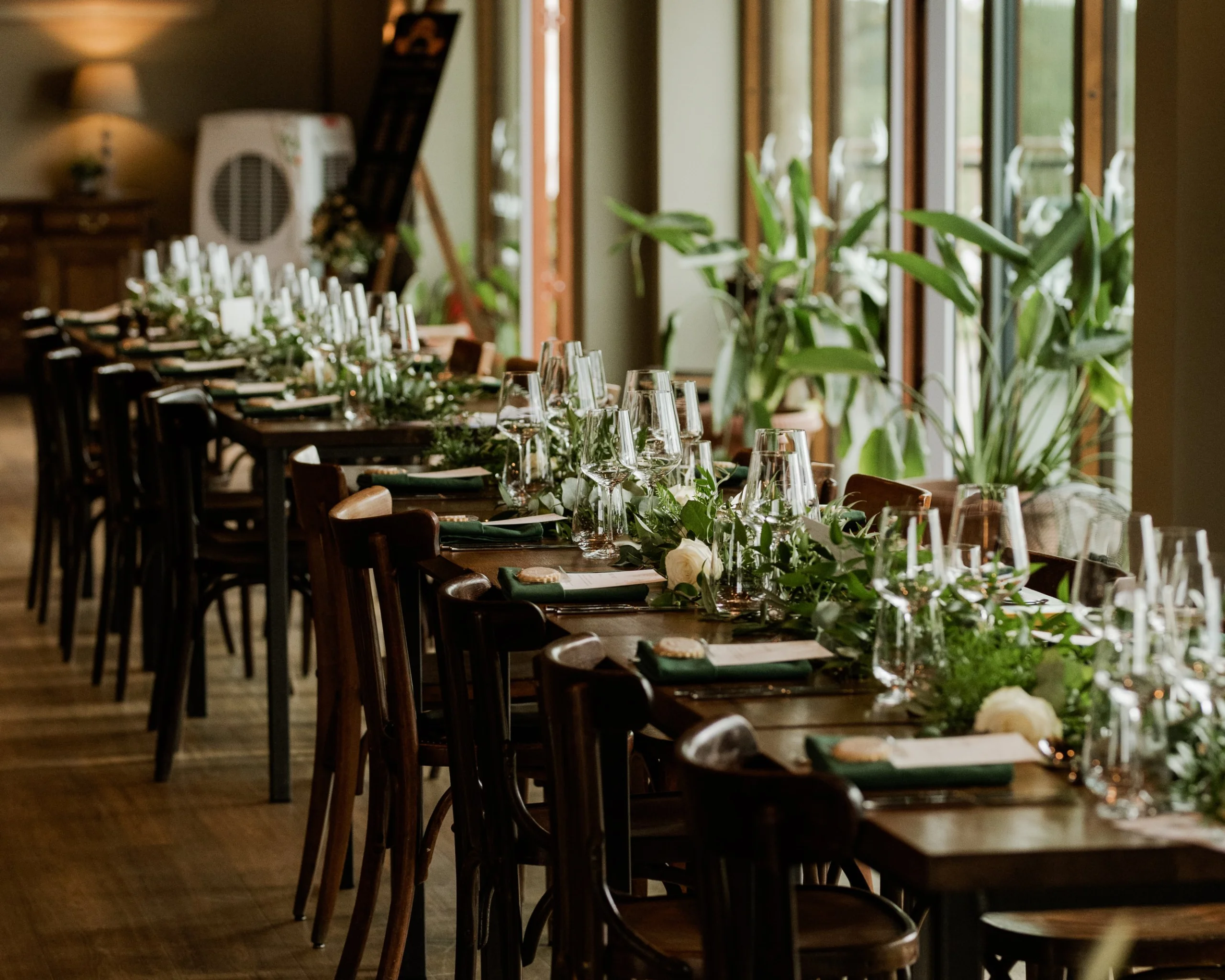 a wedding breakfast table scape setup at grain store doddington hall