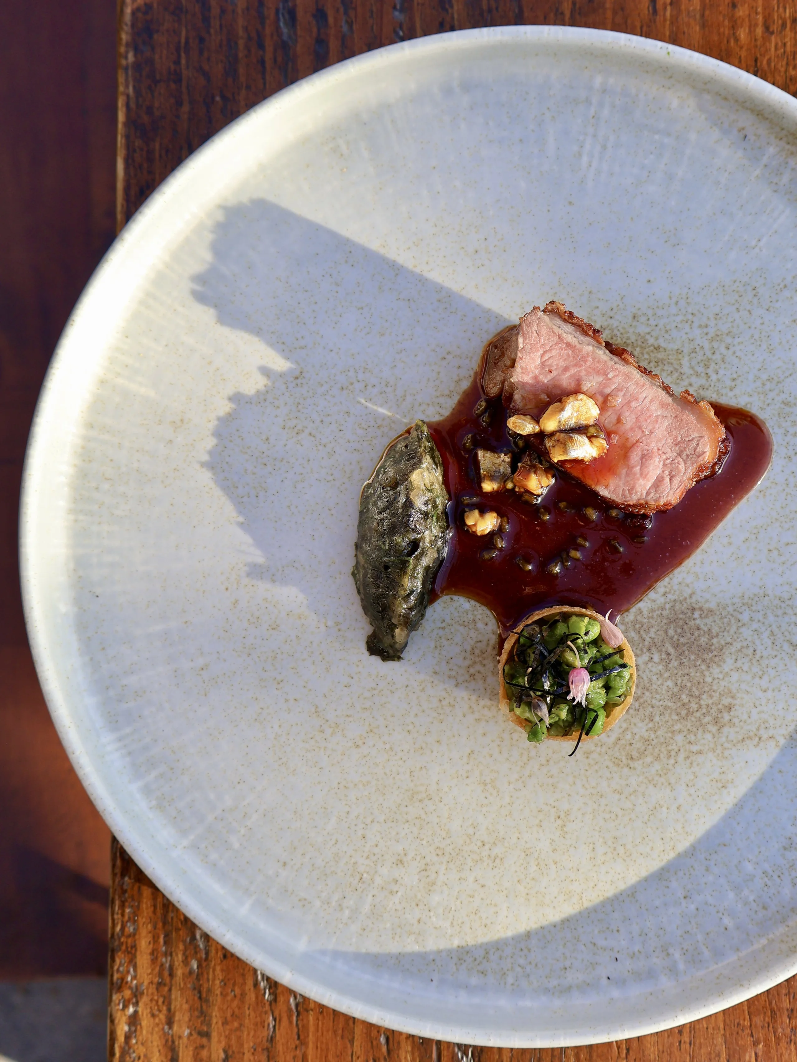 close up of lamb dish at a supper club at doddington hall grain store