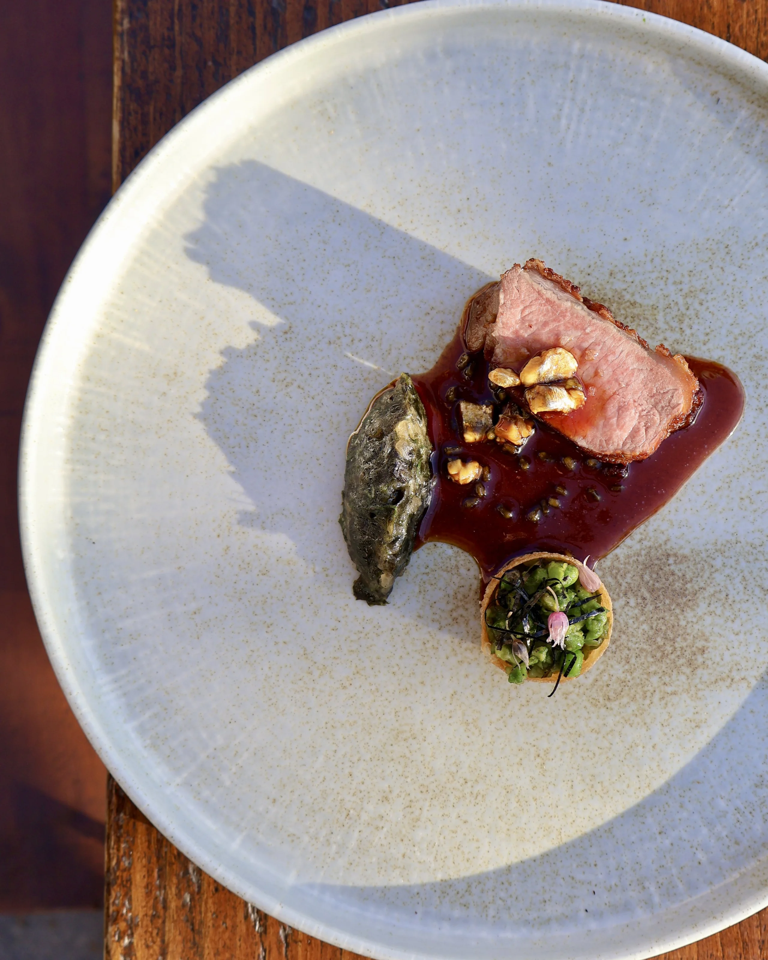 close up of lamb dish at a supper club at doddington hall grain store