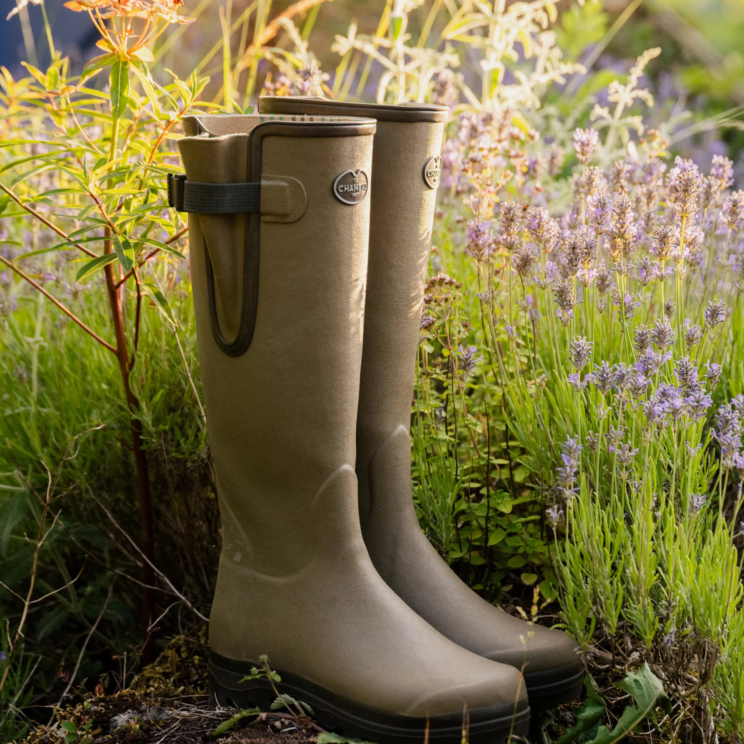 le chameau green wellies among wildflower at doddington hall country clothing