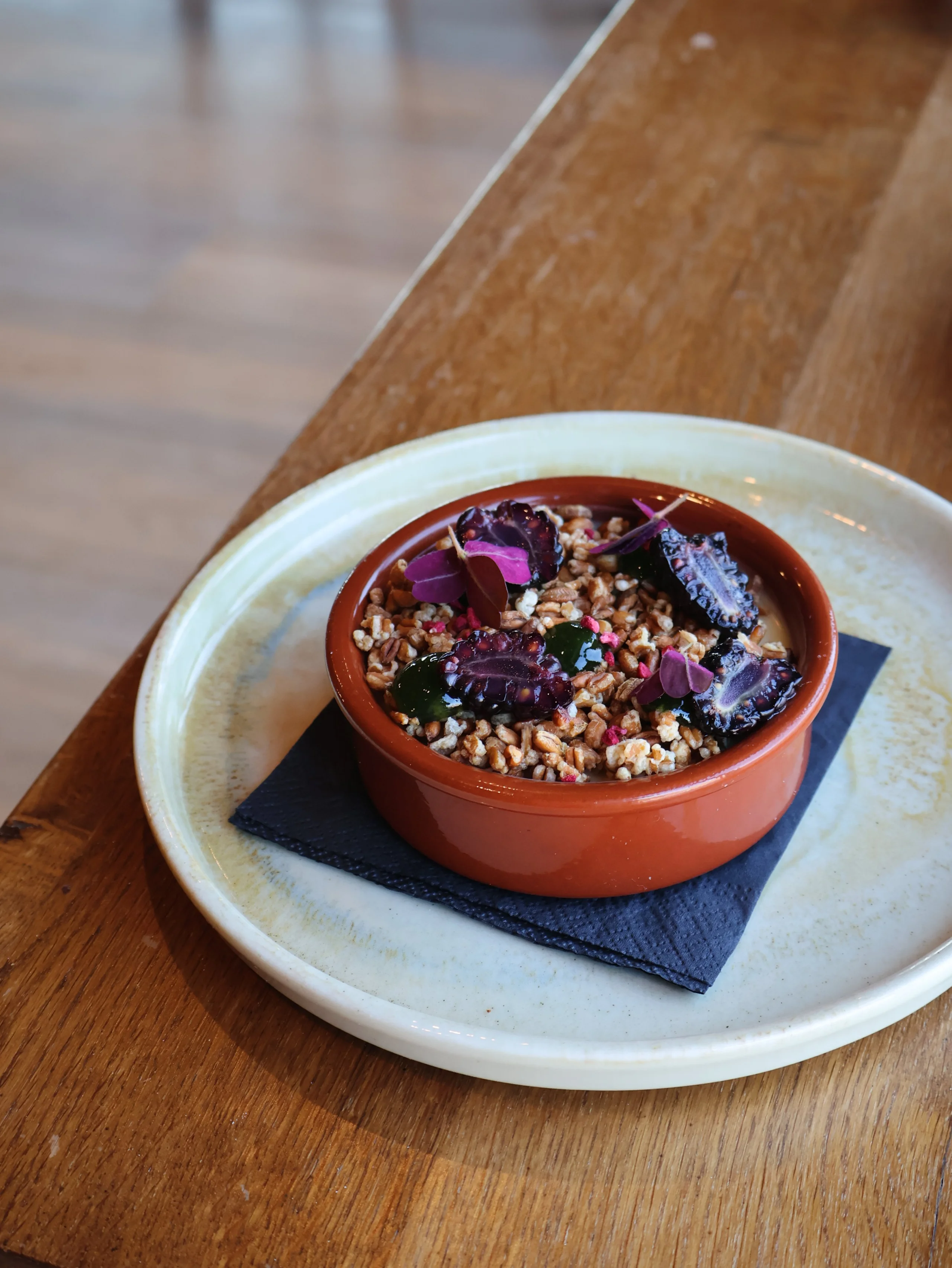 a lemon posset desert in a ceramic ramekin at doddington grain store