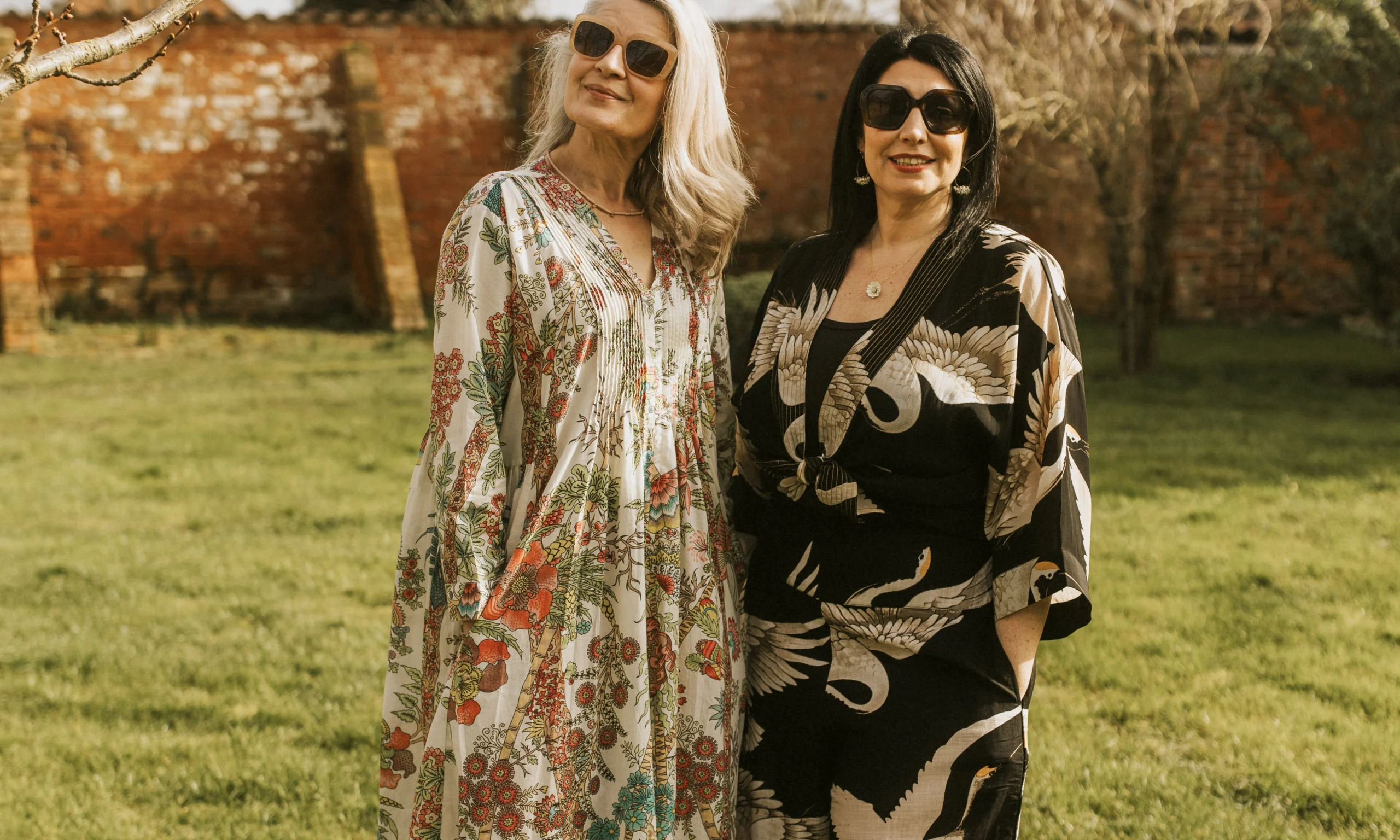 two women on the lawn at doddington hall