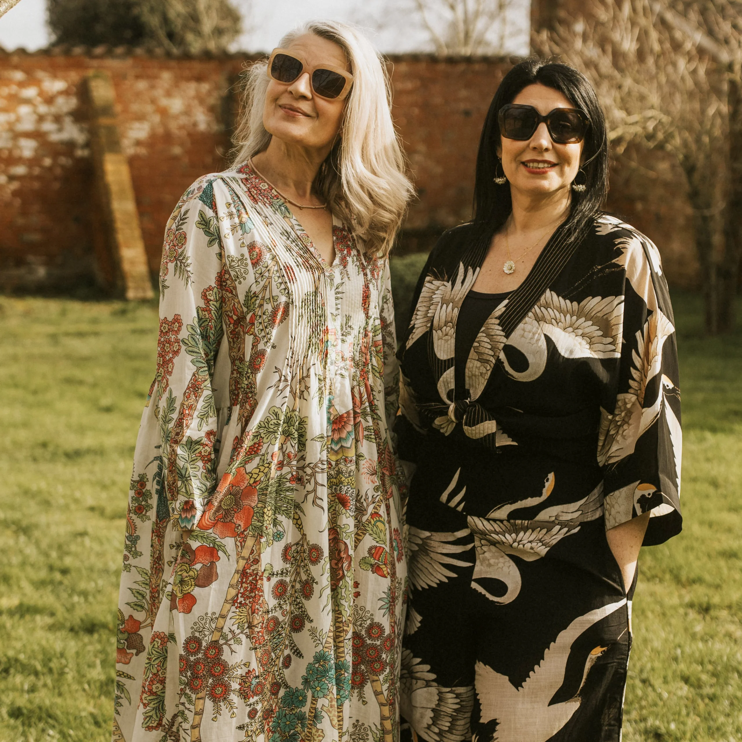 two women on the lawn at doddington hall