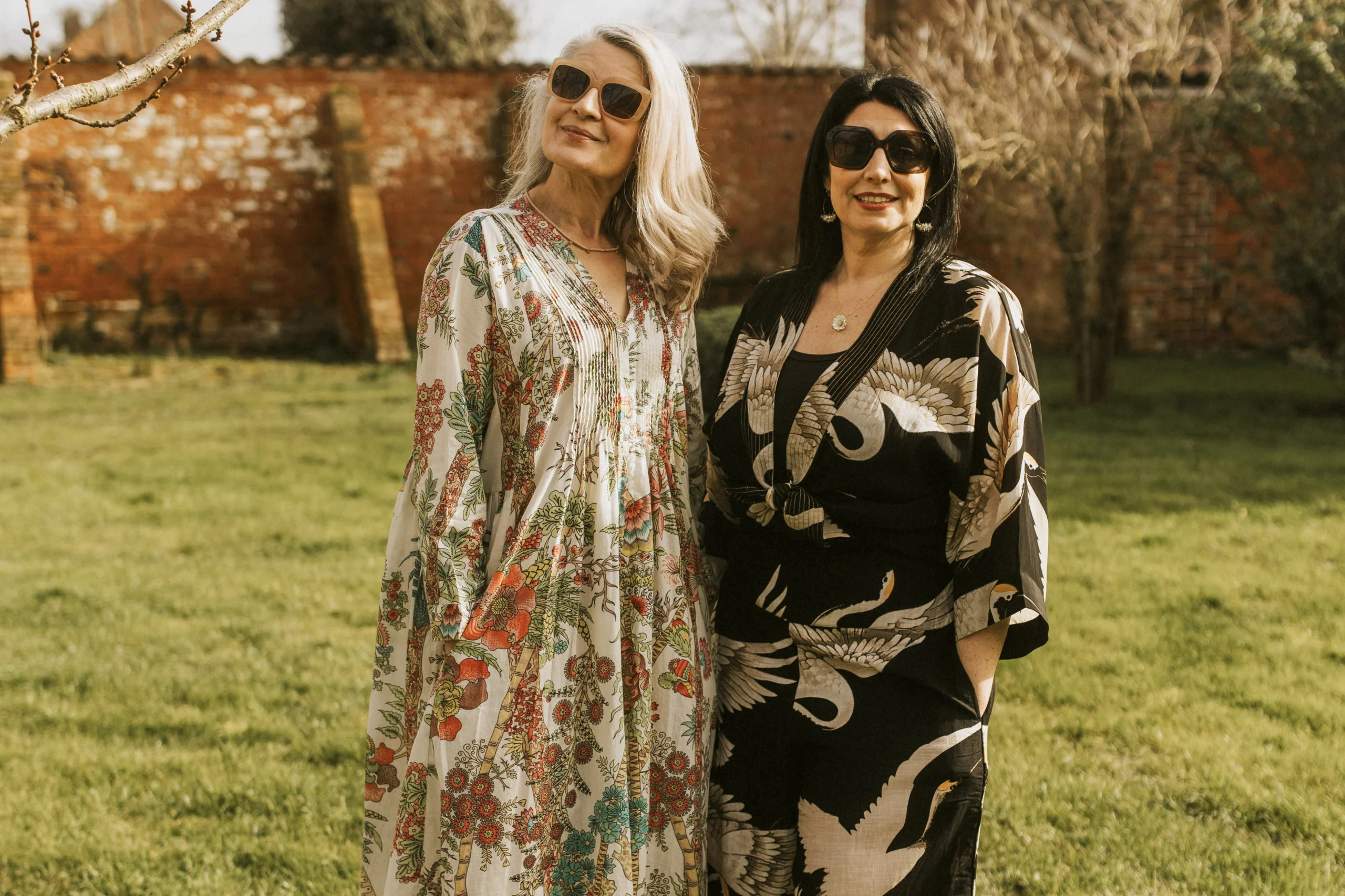 two women on the lawn at doddington hall