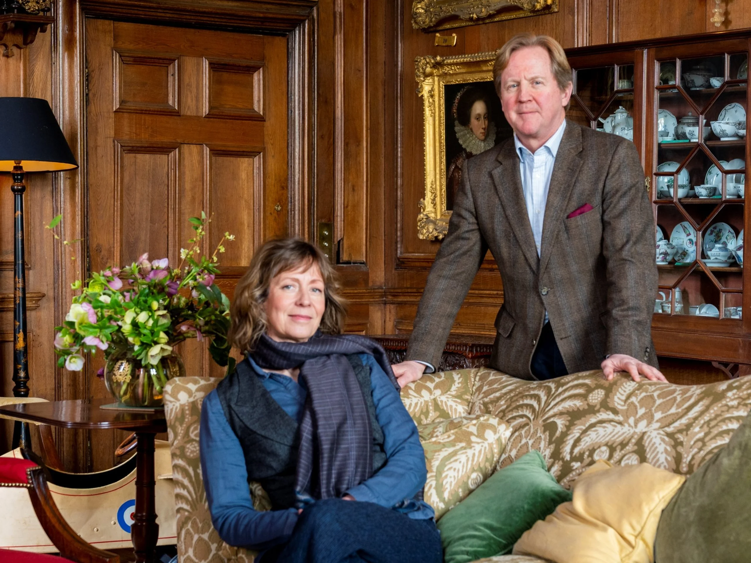 James and Claire birch sat in the formal living room at doddington hall