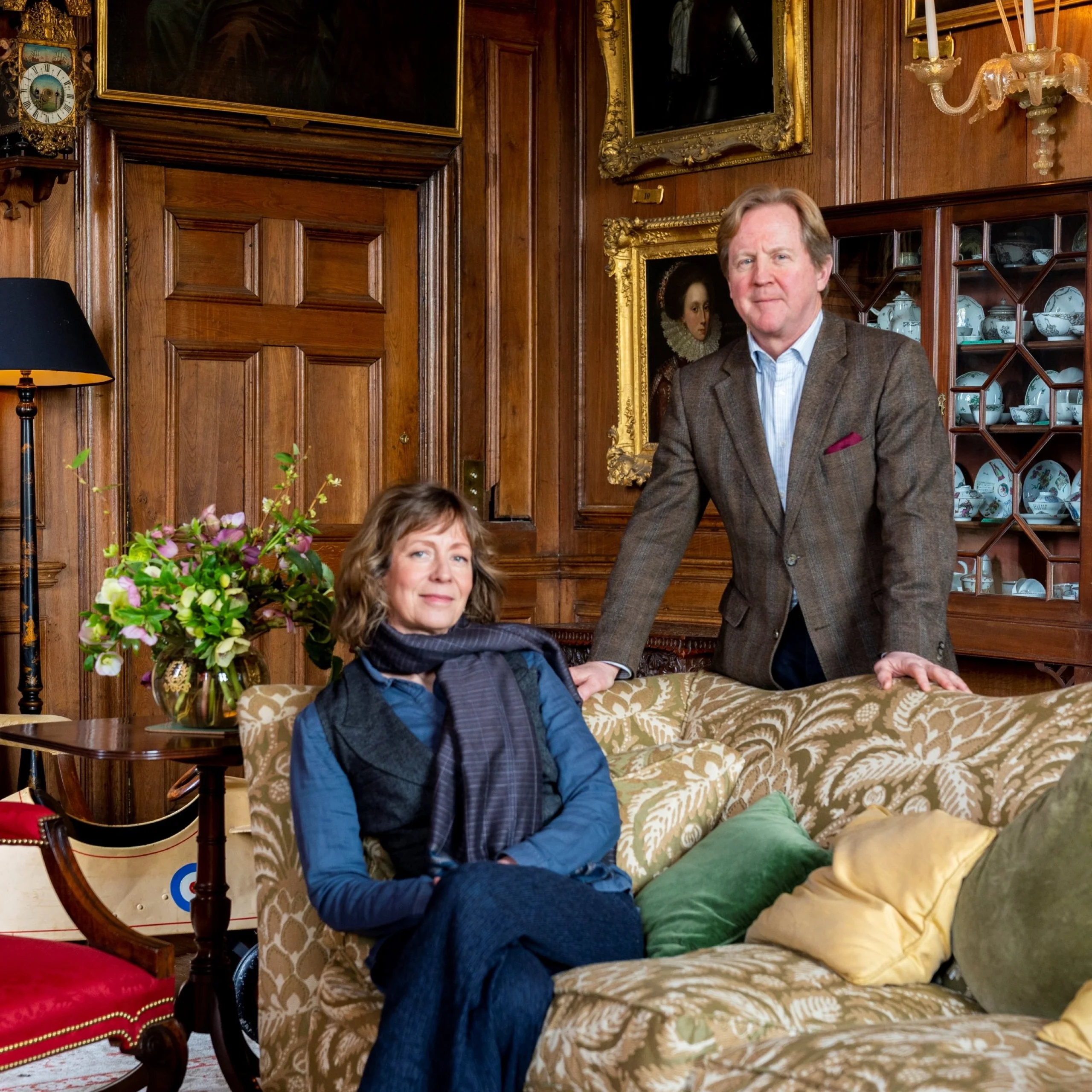 James and Claire birch sat in the formal living room at doddington hall