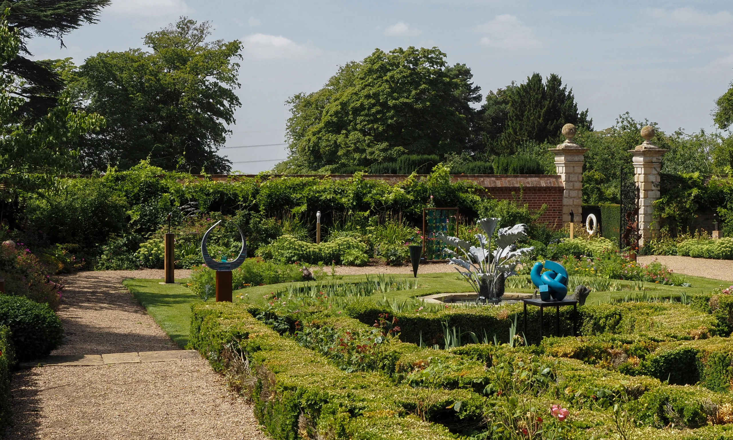 A display of sculptures in the West Garden at Doddington Hall