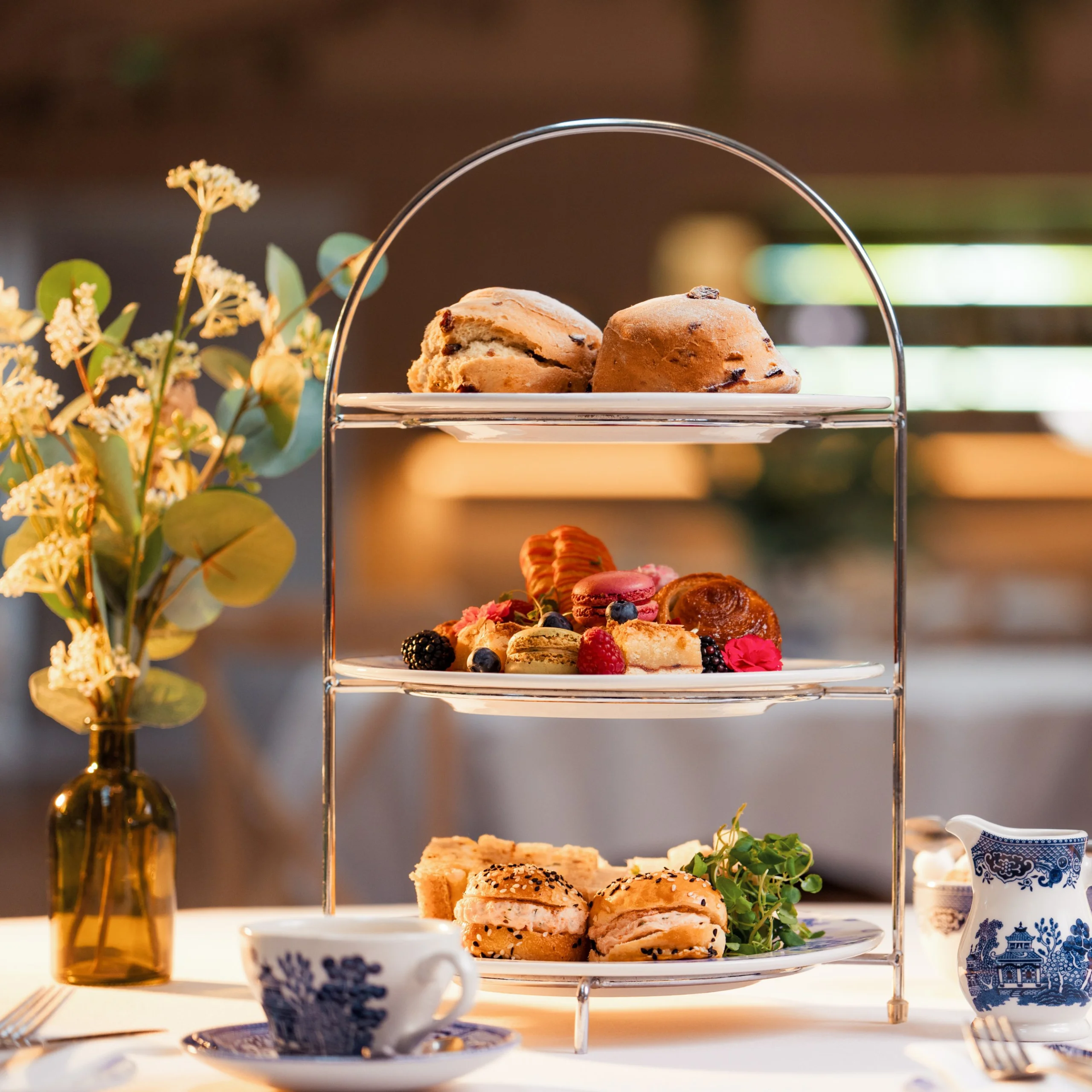 A traditional afternoon tea set up, with vintage crockery
