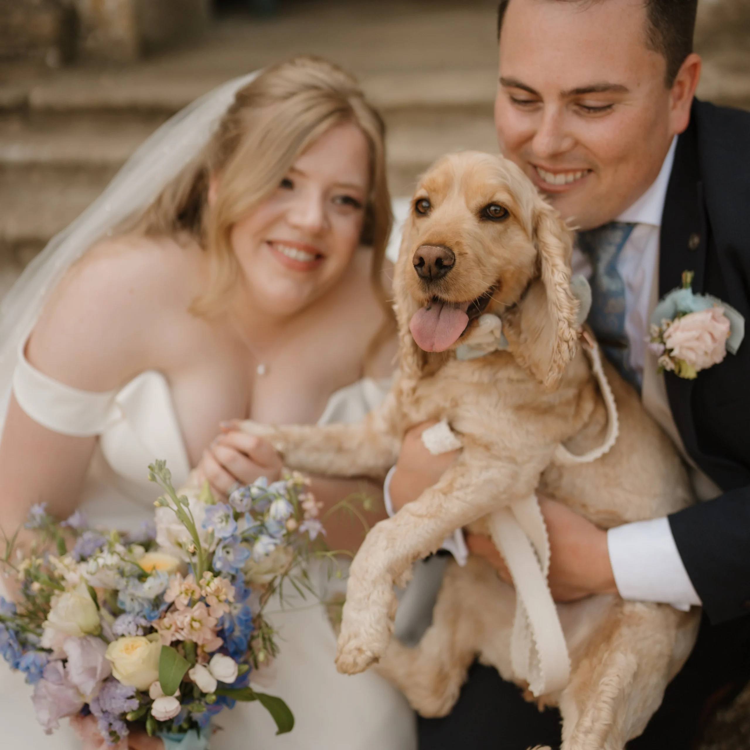 bride and groom with their dog at doddington hall