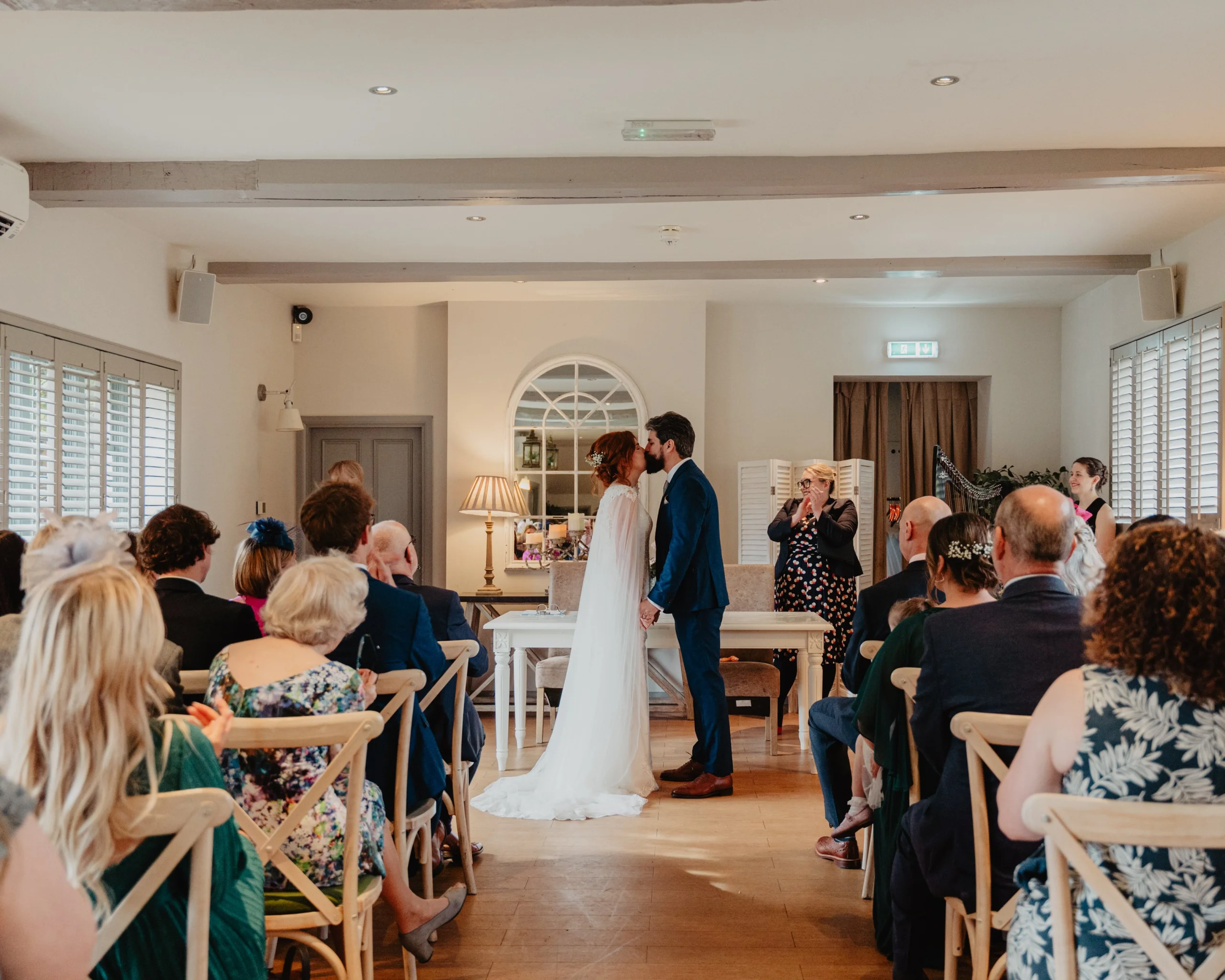 bridge and groom married in the garden room at doddington hall