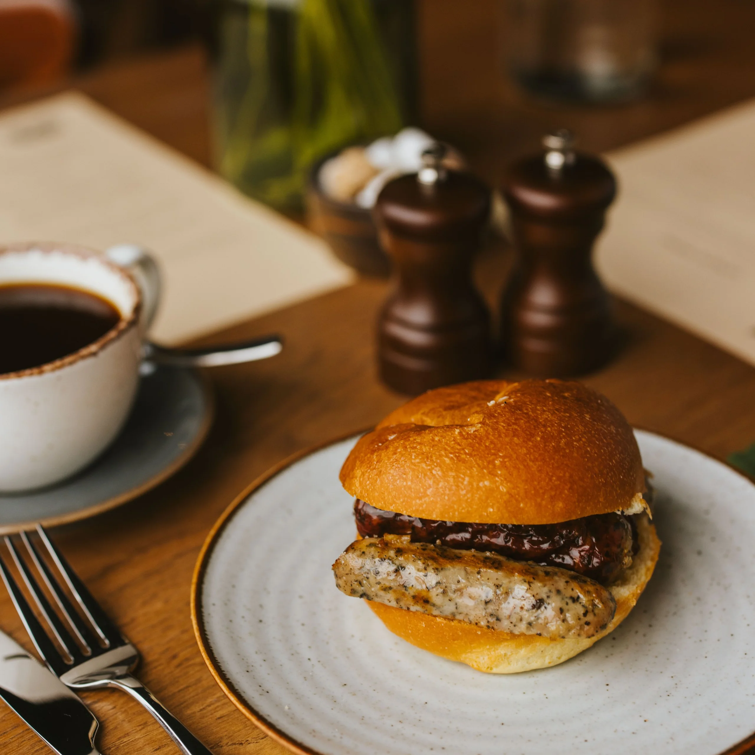 a sausage breakfast roll at doddington grain store cafe