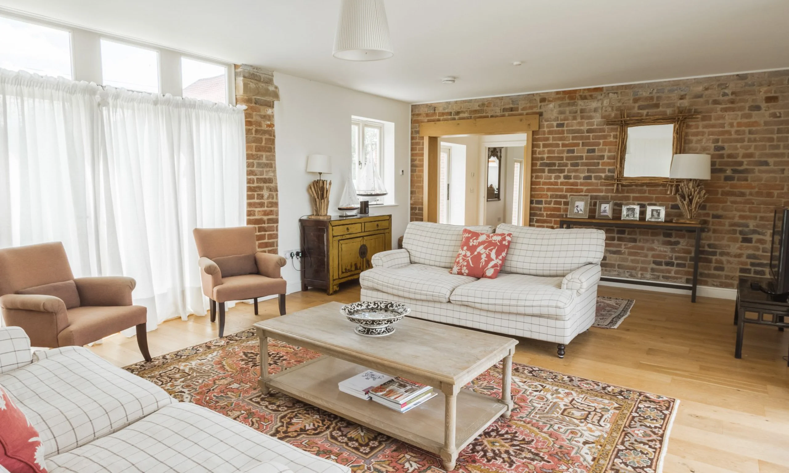 a living room interior with sofas at the shakespeare cottage at doddington hall