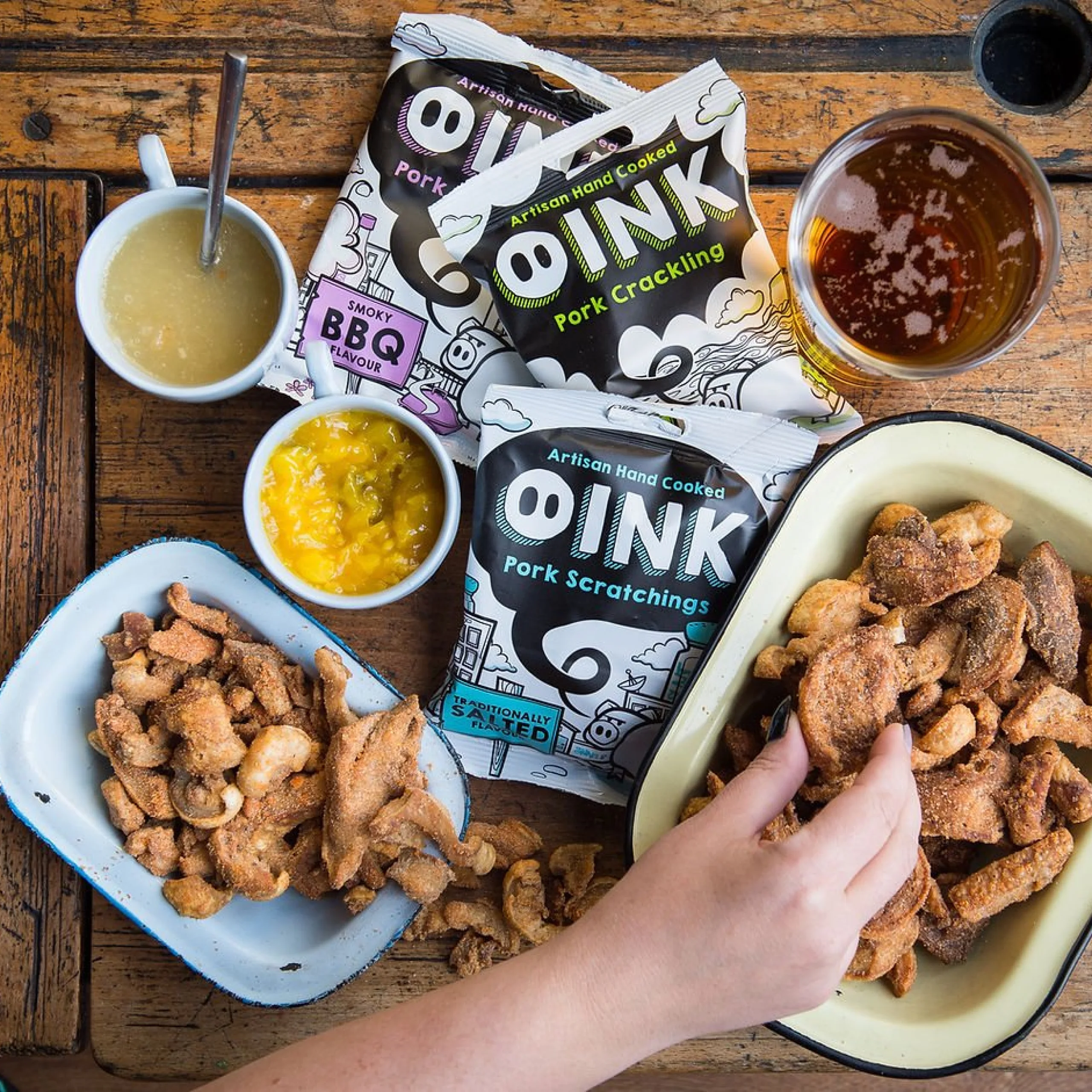 oink pork snacks on a wooden table