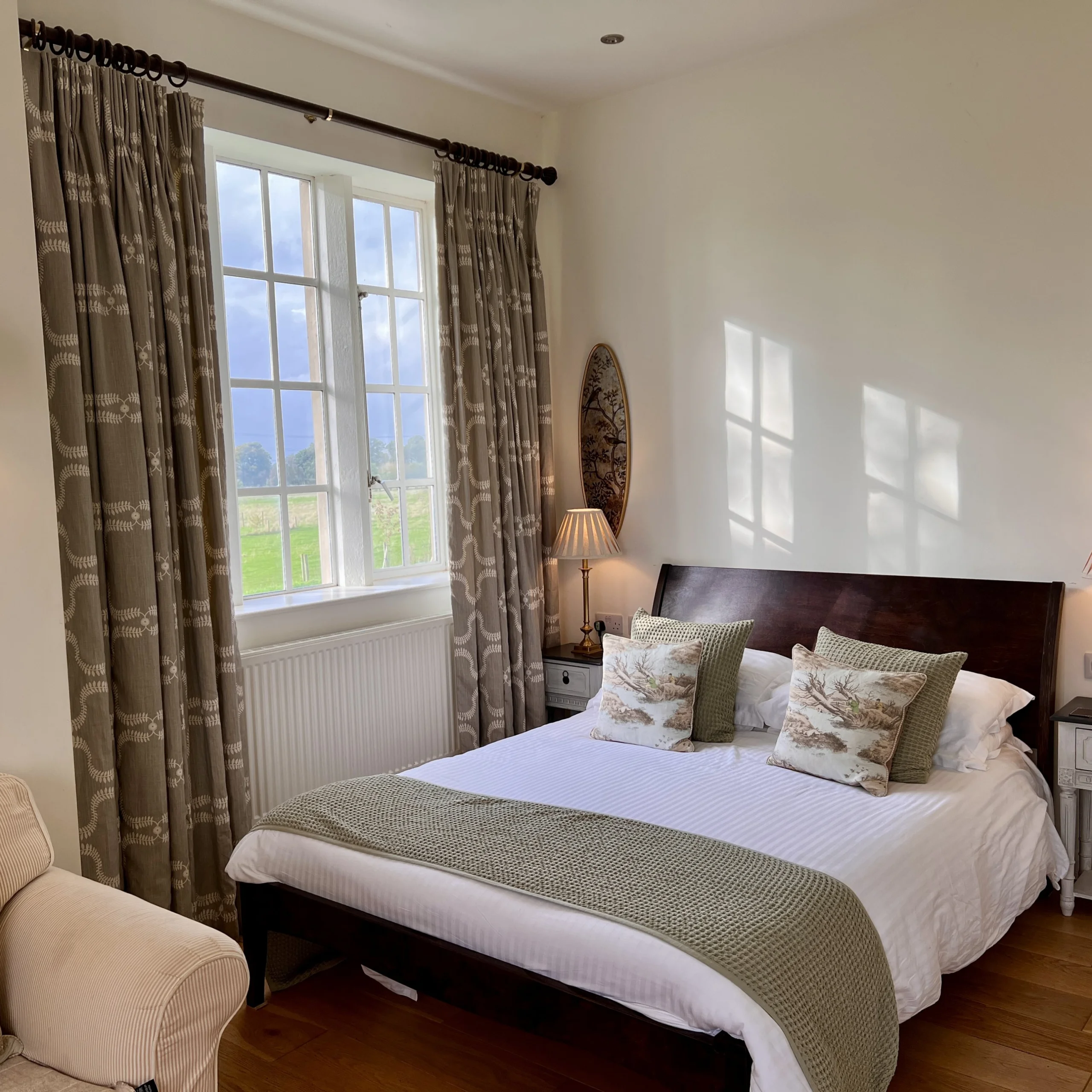 an interior photo of a bedroom inside the tailor rooms at doddington hall