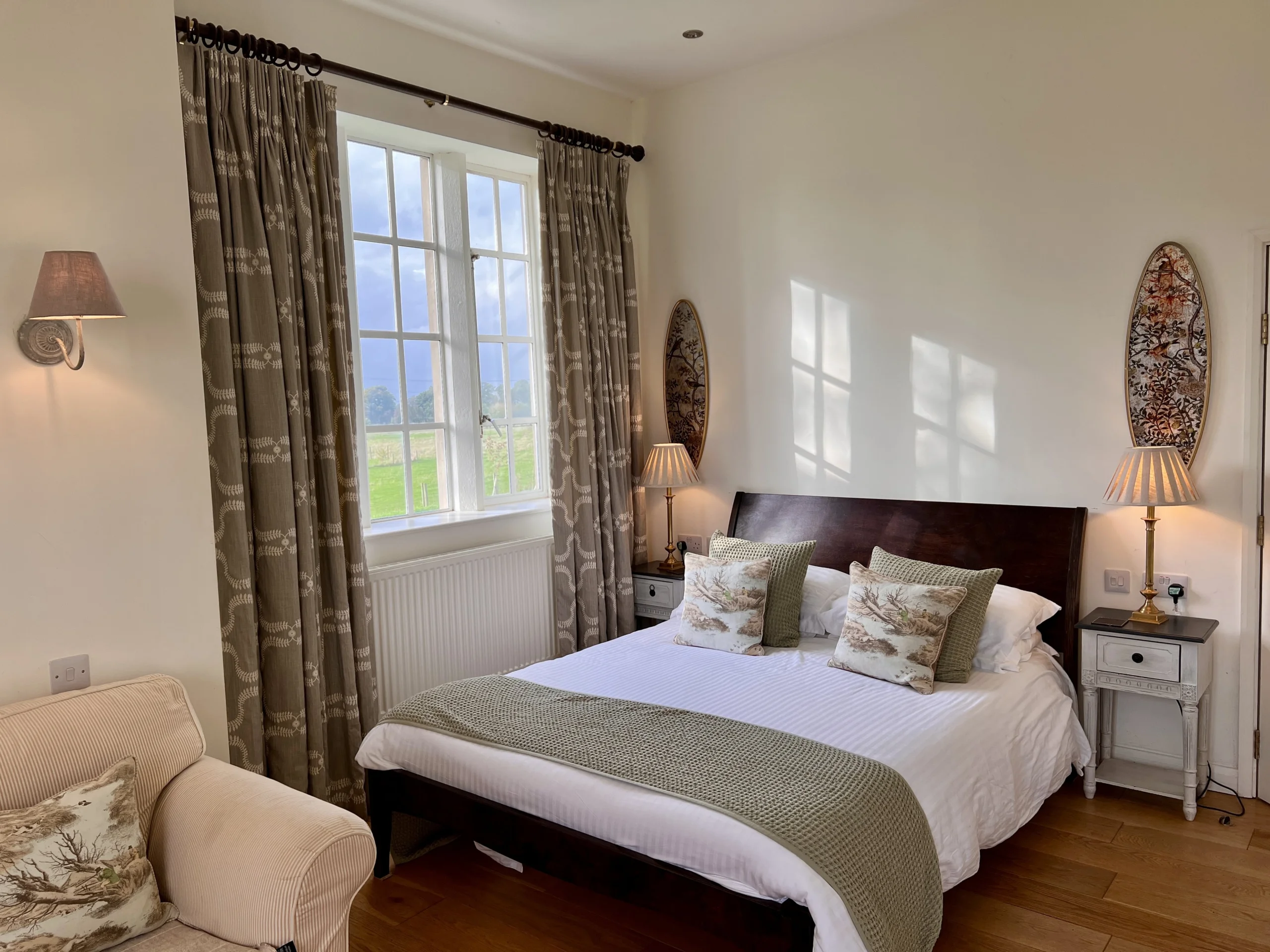 an interior photo of a bedroom inside the tailor rooms at doddington hall