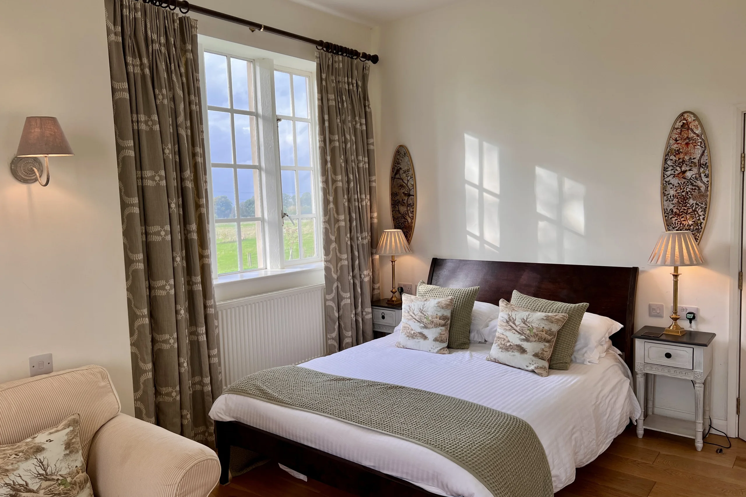 an interior photo of a bedroom inside the tailor rooms at doddington hall