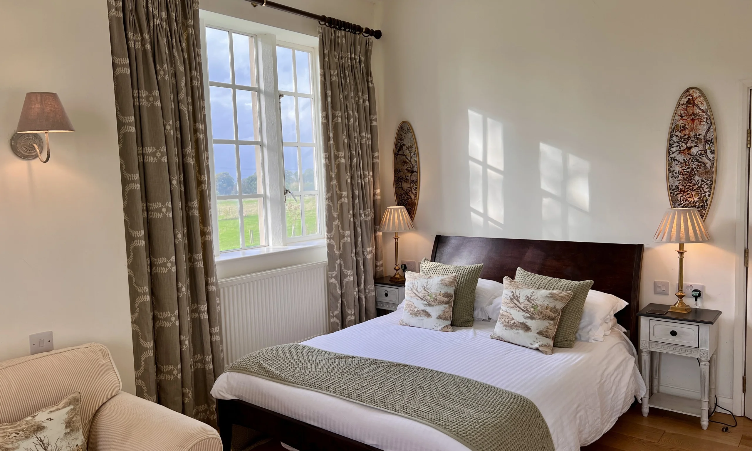 an interior photo of a bedroom inside the tailor rooms at doddington hall