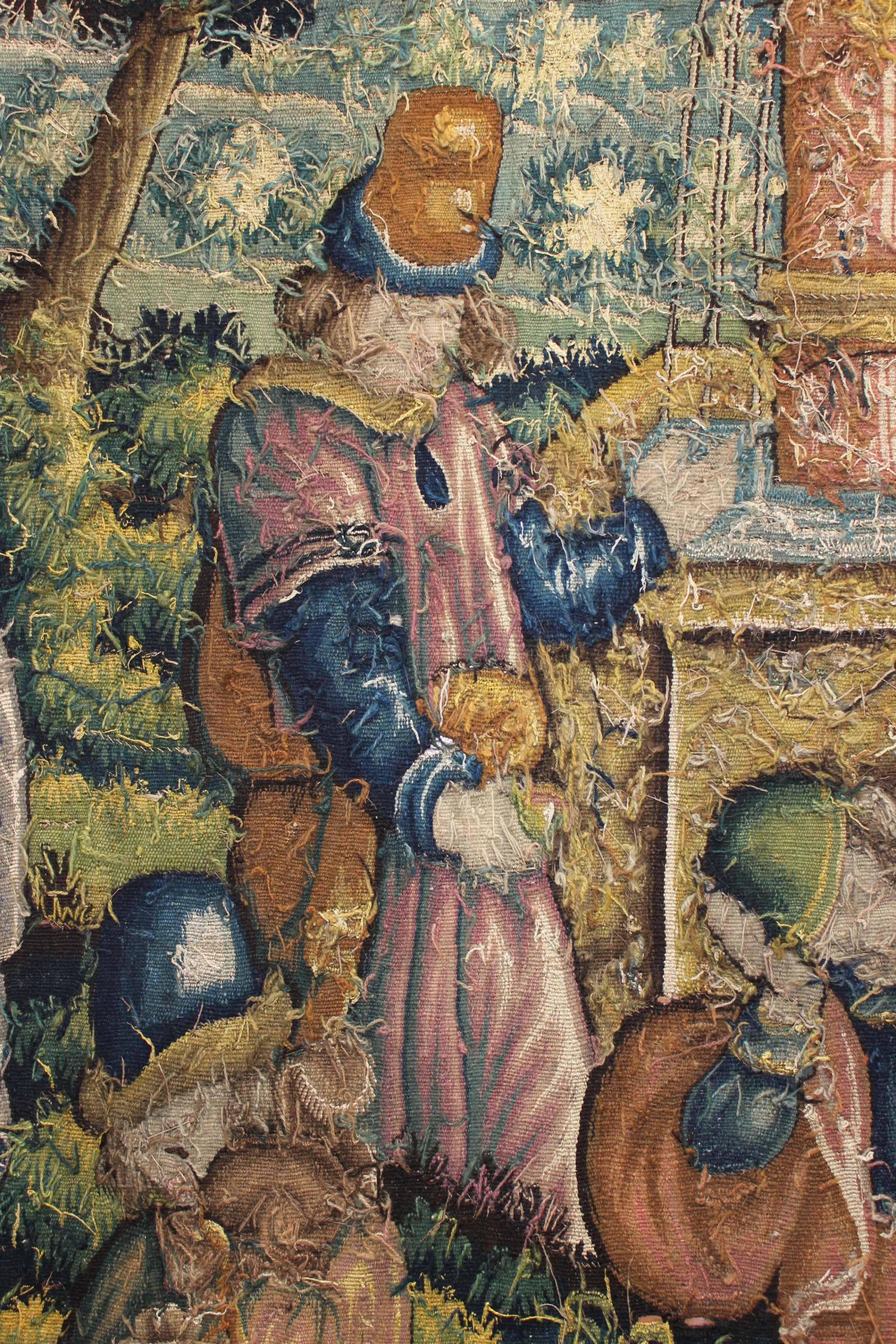 an old tapestry before conservation at doddington hall