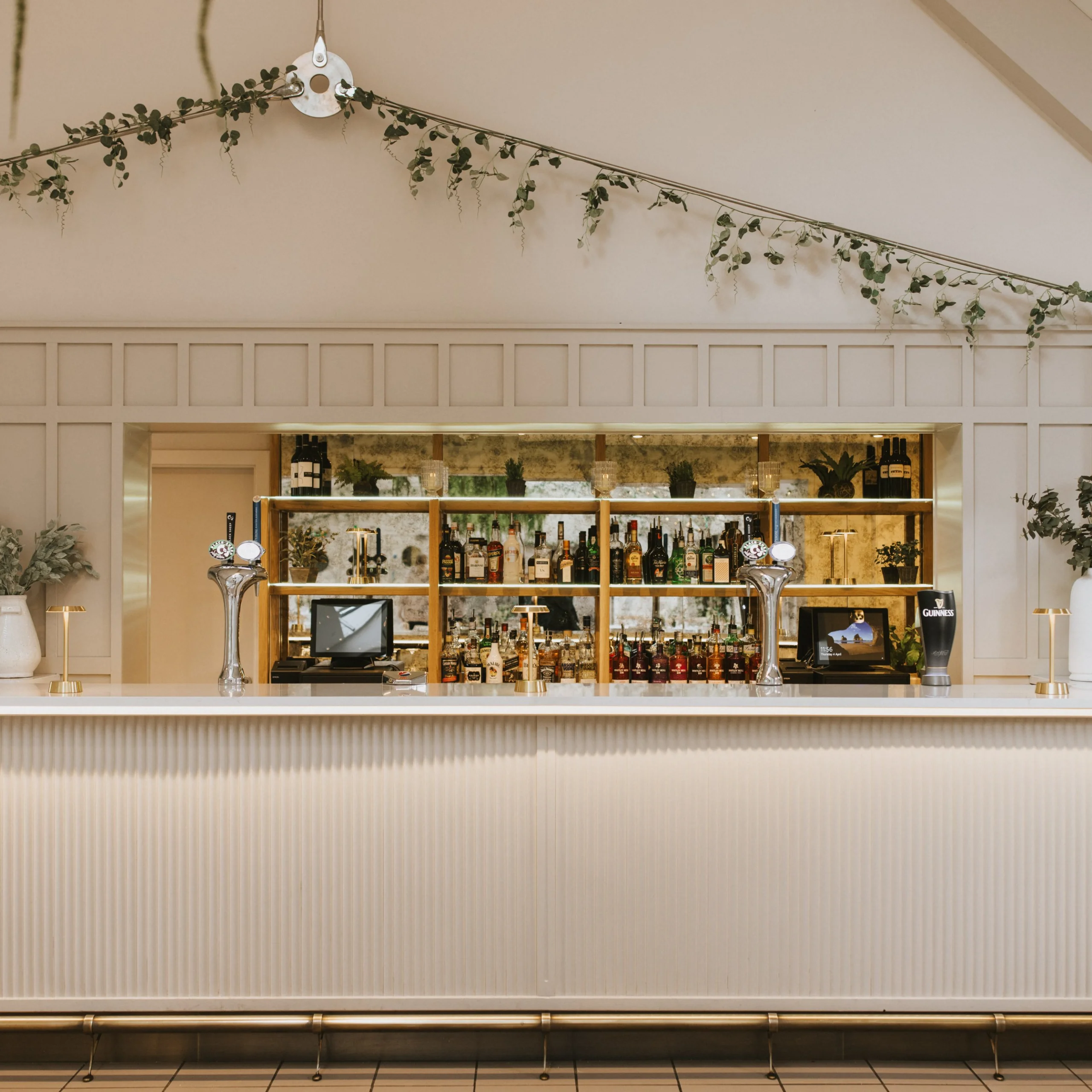 a white bar inside the coach house at doddington hall